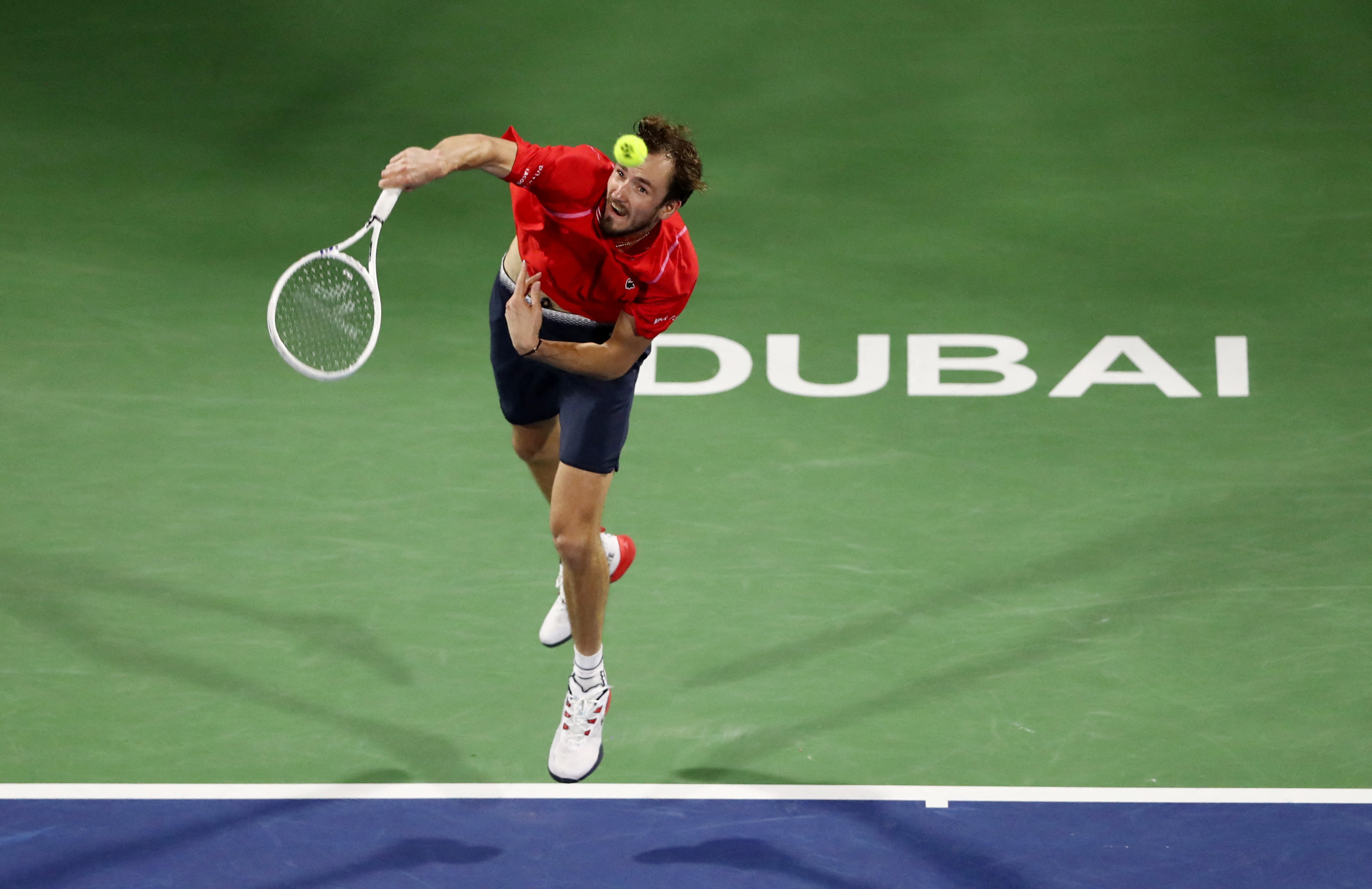 Dubai, UAE, 4th.March, 2023. Russian tennis players at the trophy  presentation, Winner Daniil Medvedev (red shirt) and runner-up Andrey  Rublev at the Dubai Duty Free Tennis Championships tournament at Dubai Duty  Free