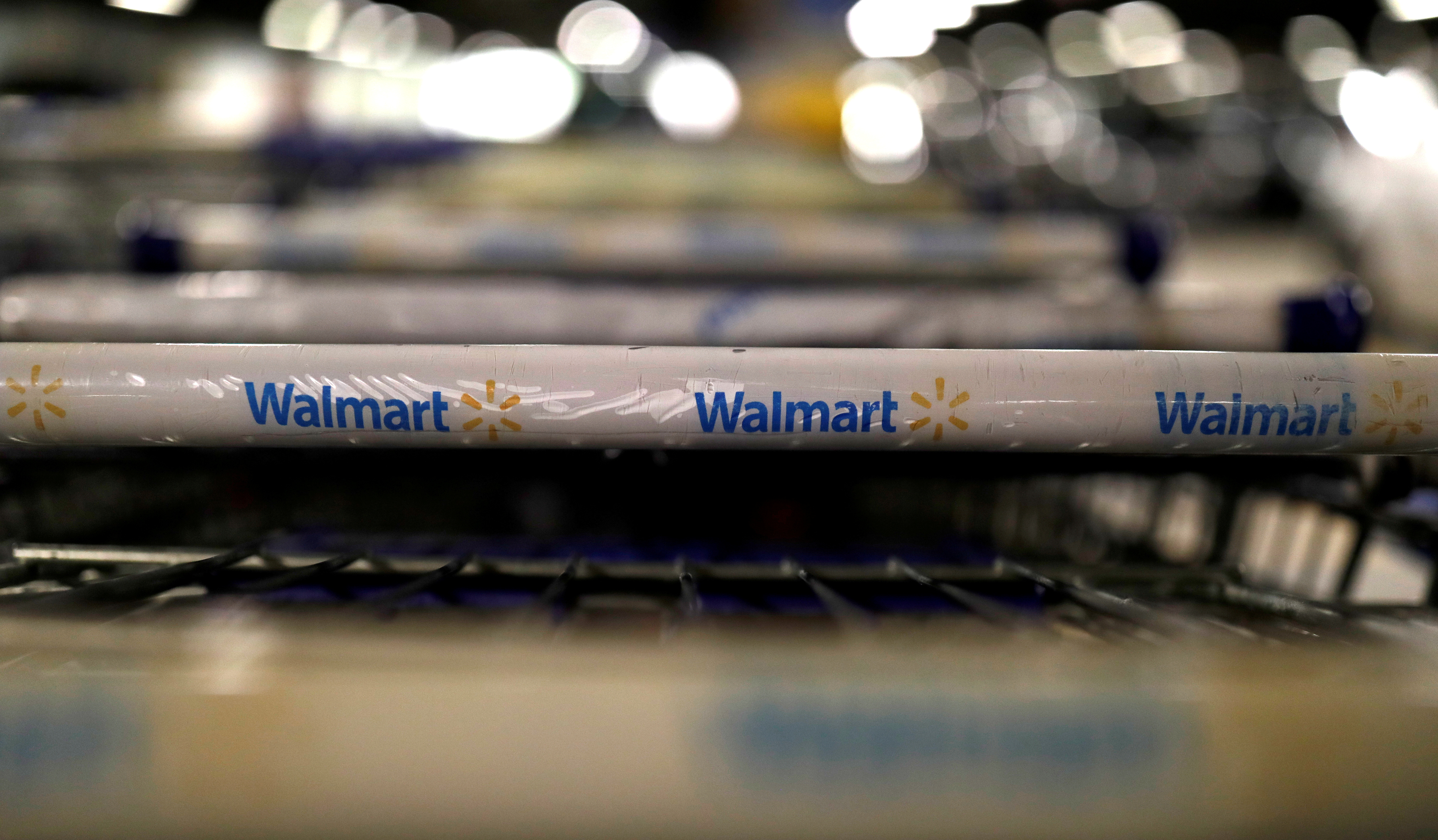 The logo of Walmart is seen on shopping trolleys at their store in Sao Paulo, Brazil February 14, 2018. REUTERS/Paulo Whitaker