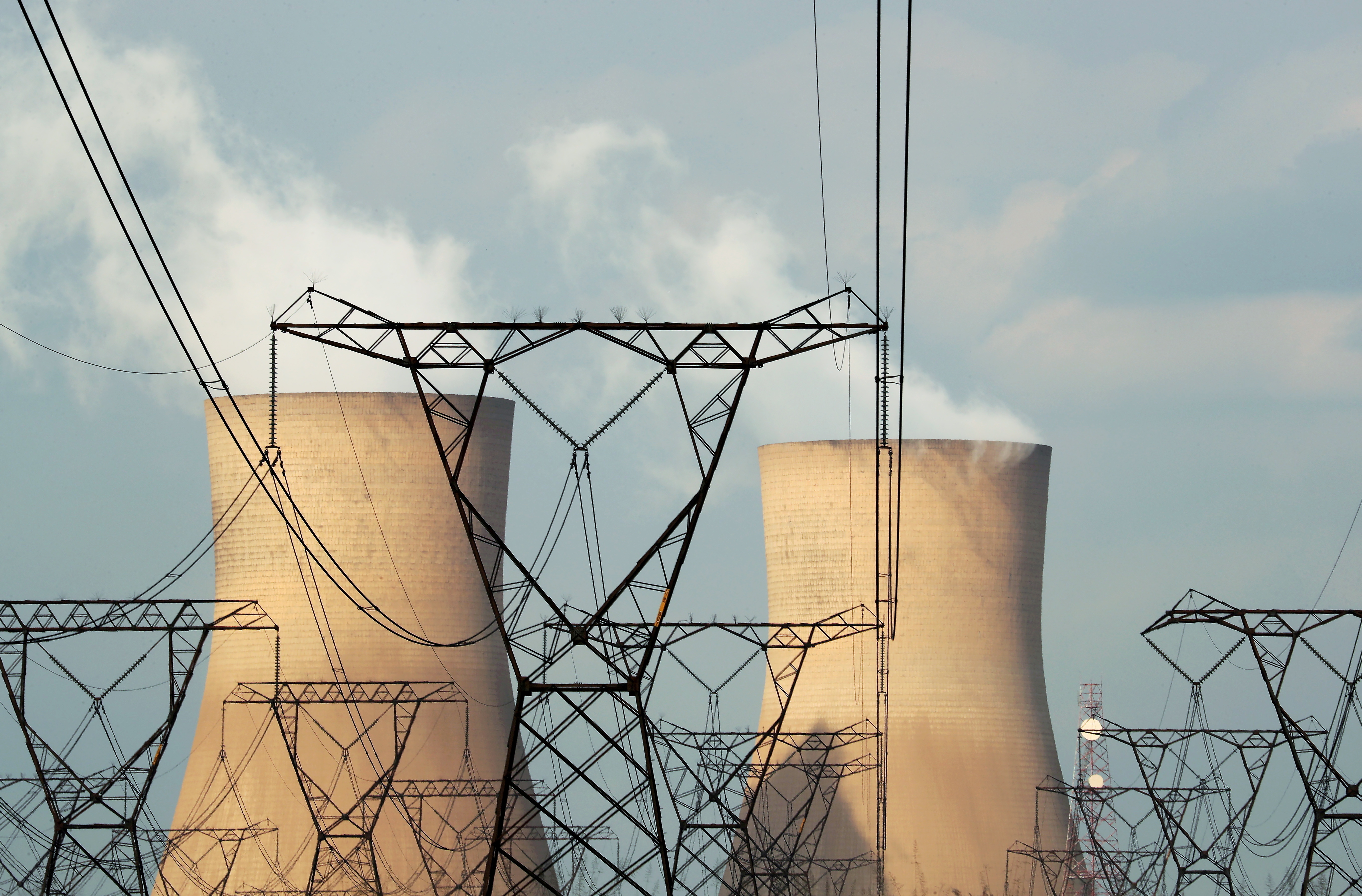 oFILE PHOTO: Cooling towers are pictured at a coal-based power station owned by Eskom in Duhva