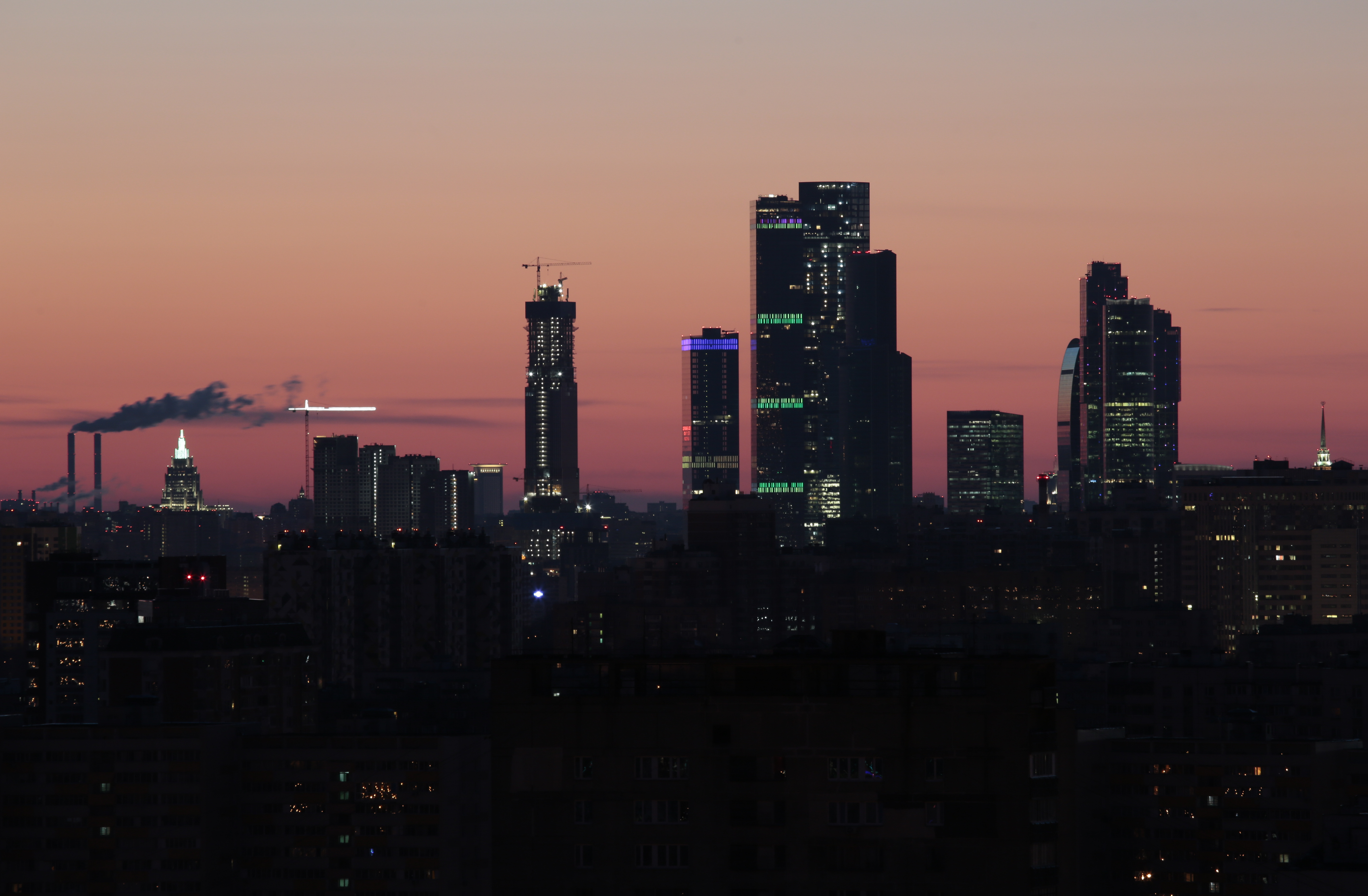 A general view shows the skyscrapers of the Moscow International Business Centre during sunrise in Moscow