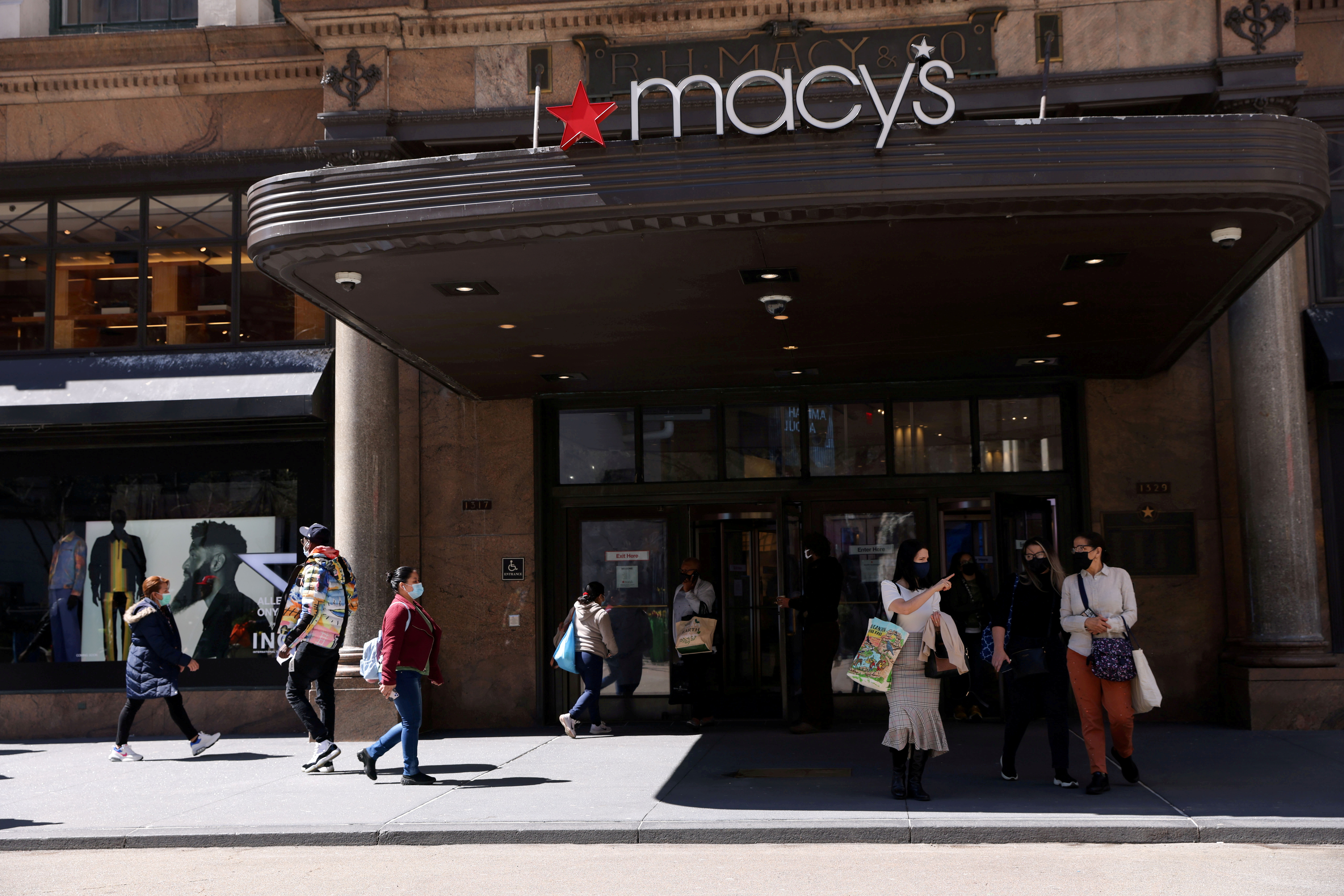 FILE PHOTO: Shoppers are seen outside Macy's in the Manhattan borough of New York City