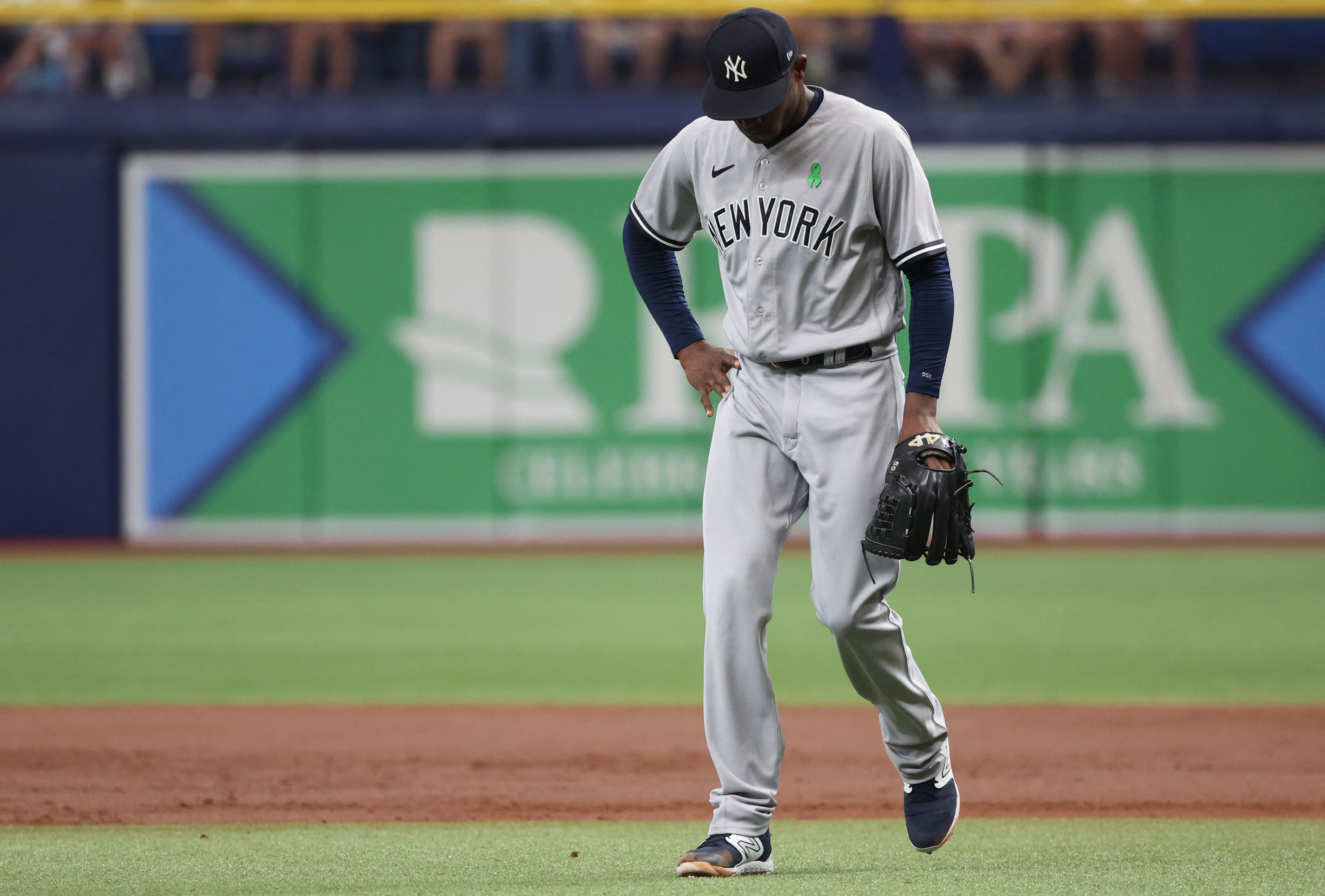 Yankees score 3 runs in 8th inning to end Rays' win streak