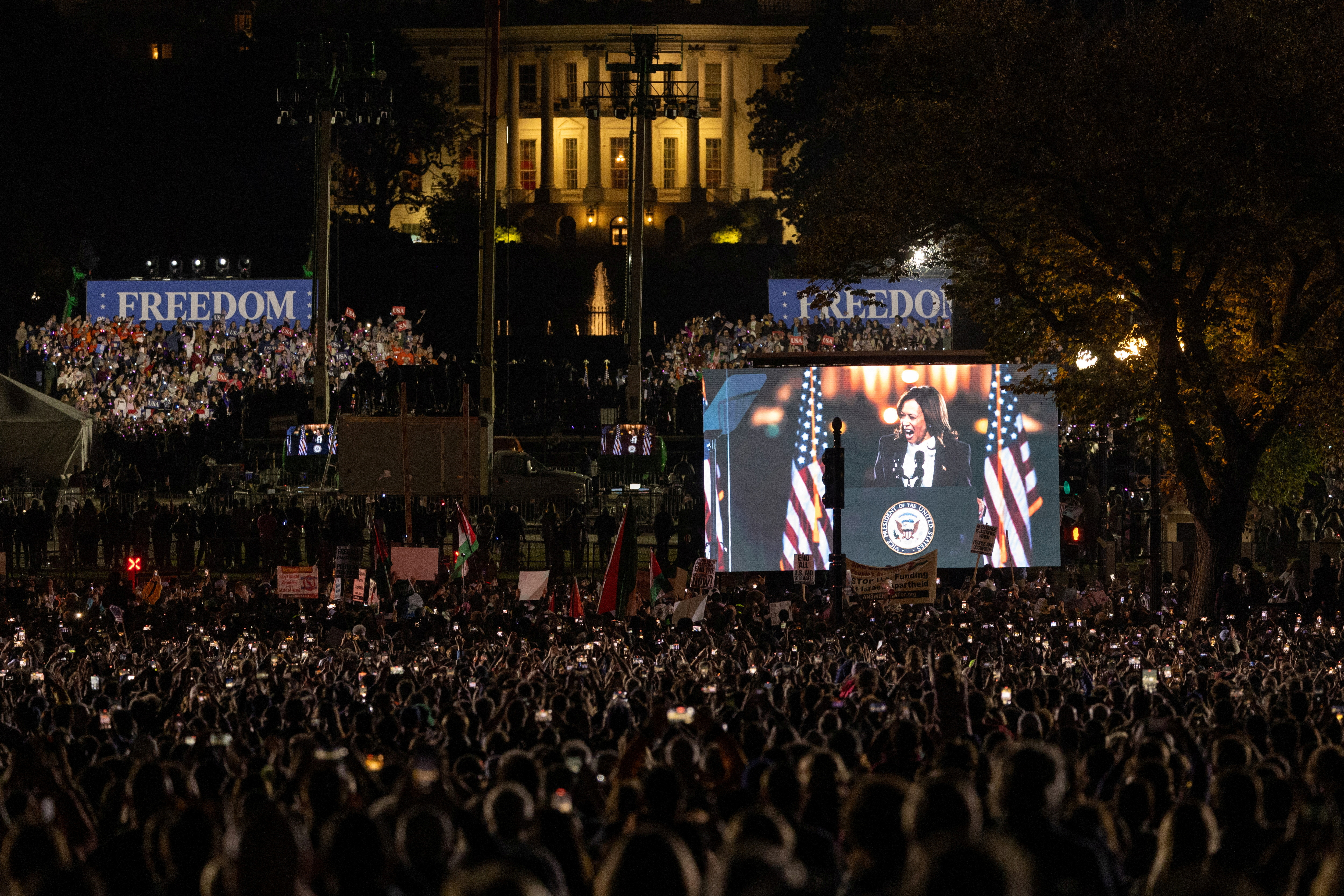 Democratic presidential nominee U.S. Vice President Kamala Harris delivers a speech, on the National Mall in Washington