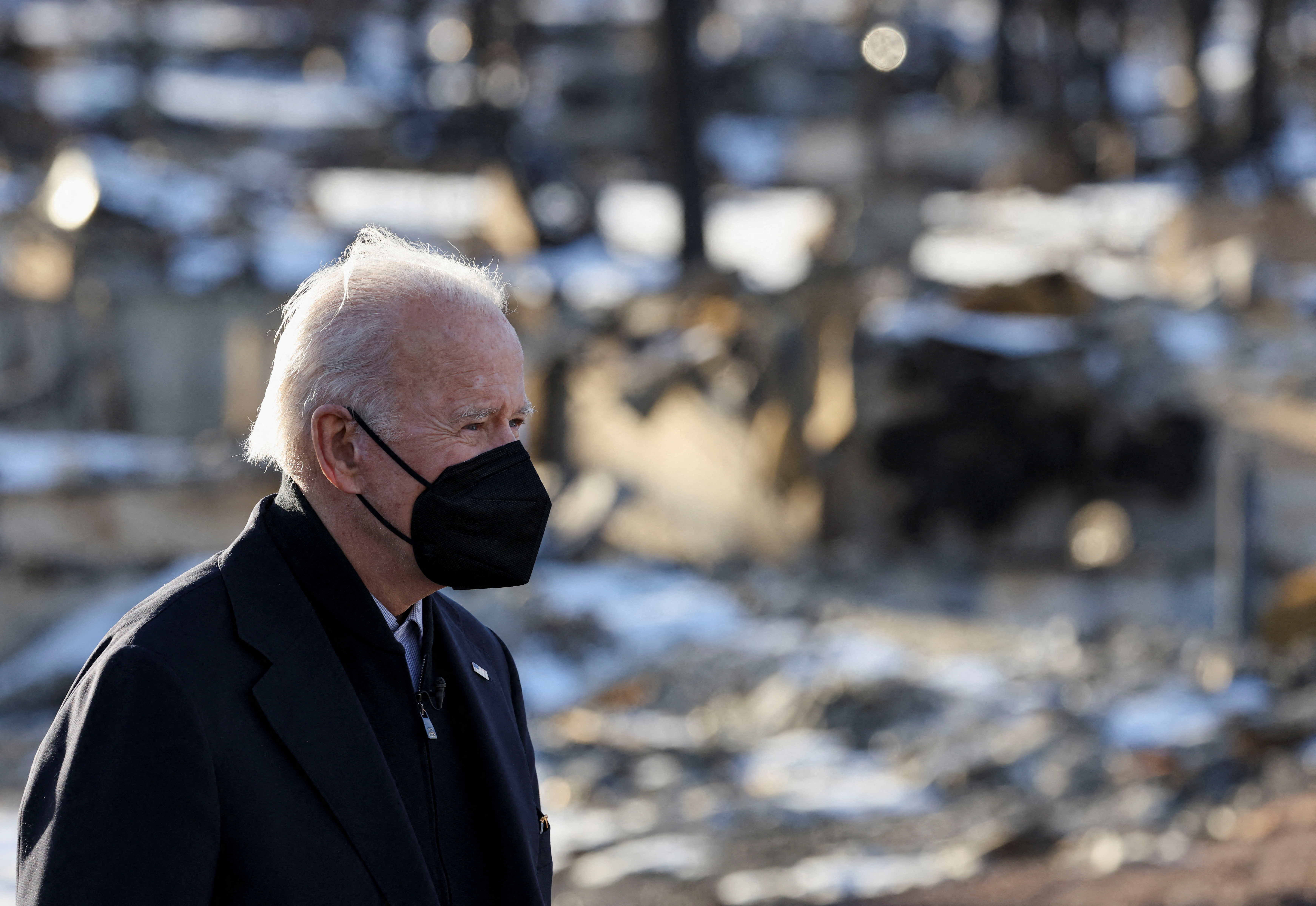 U.S. President Joe Biden tours a neighborhood in Louisville, Colorado, U.S., January 7, 2022. REUTERS/Evelyn Hockstein