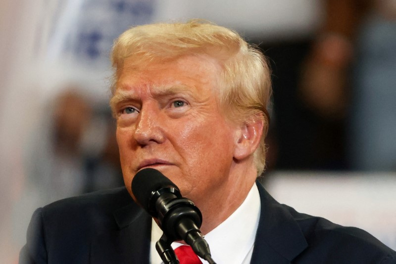 Republican presidential nominee and former U.S. President Donald Trump and his running mate JD Vance hold a campaign rally in Atlanta, Georgia