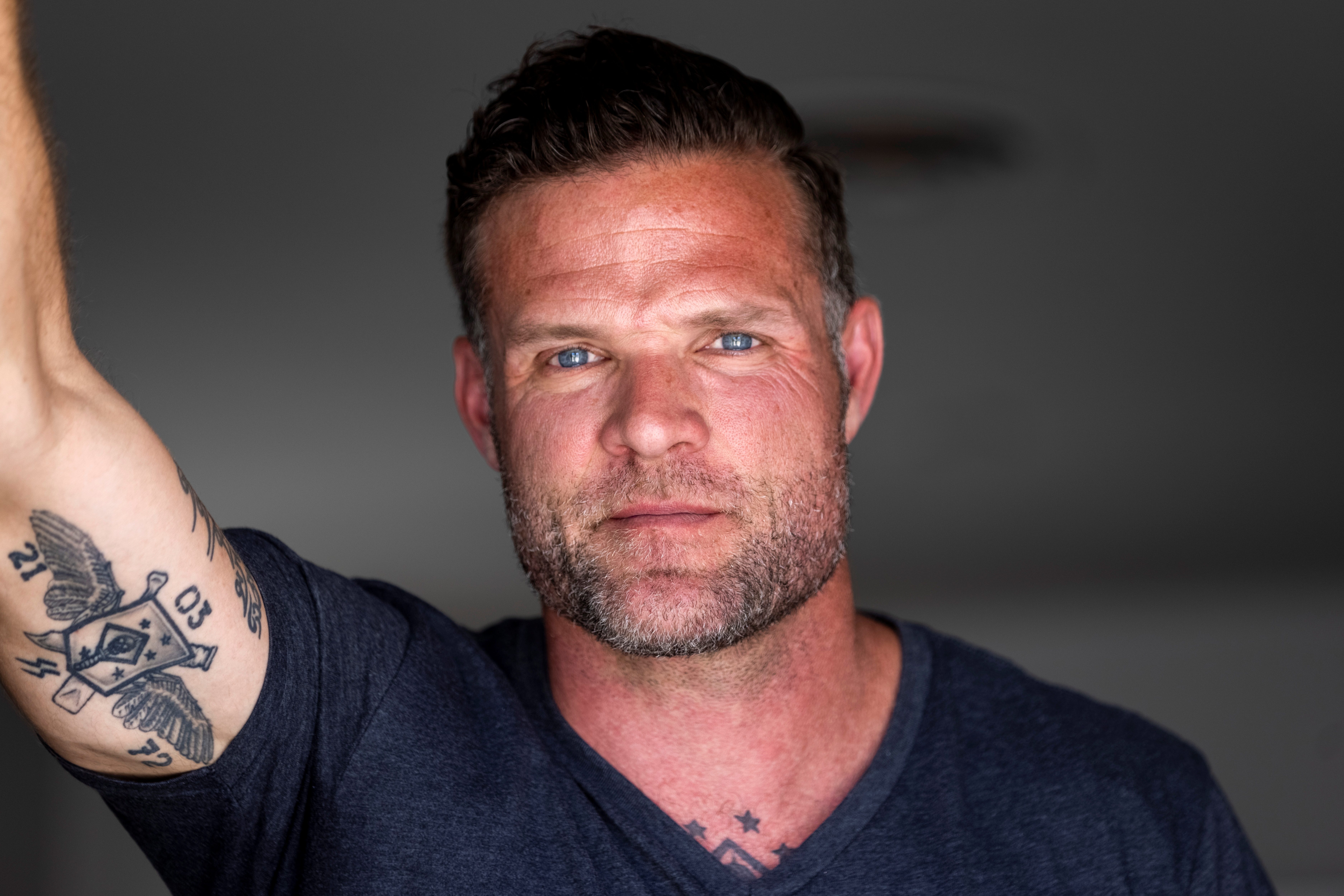 A U.S special forces veteran Jason Lilley poses for a portrait at his home in Garden Grove, California, U.S.,  July 9, 2021. Lilley spoke to Reuters about his experience in Afghanistan and his thoughts as the U.S. leaves the country.  Picture taken July 9, 202.   REUTERS/Mike Blake
