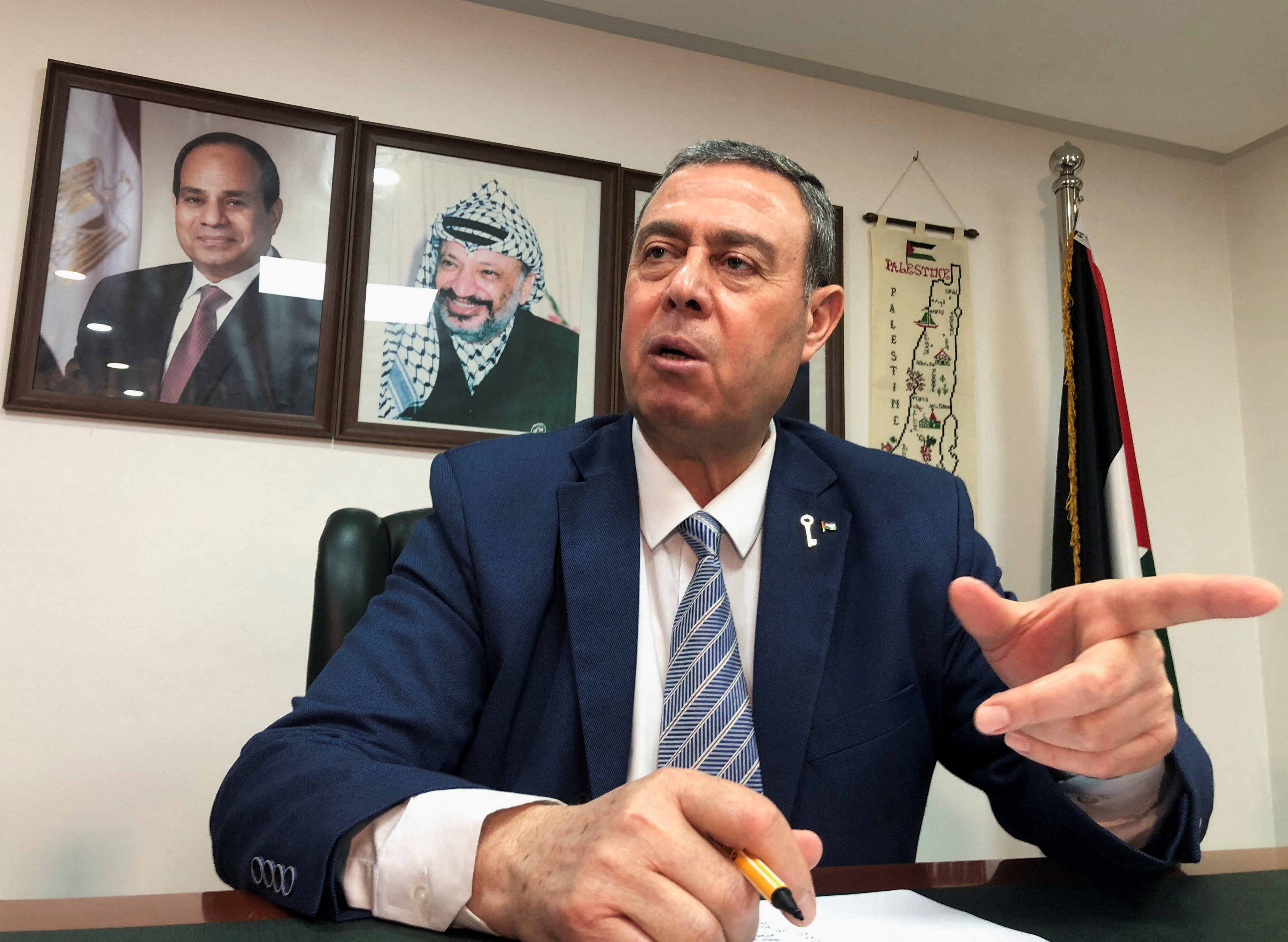 Palestinian Ambassador to Egypt Diab al-Louh speaks during an interview with Reuters at the Palestine embassy in Cairo