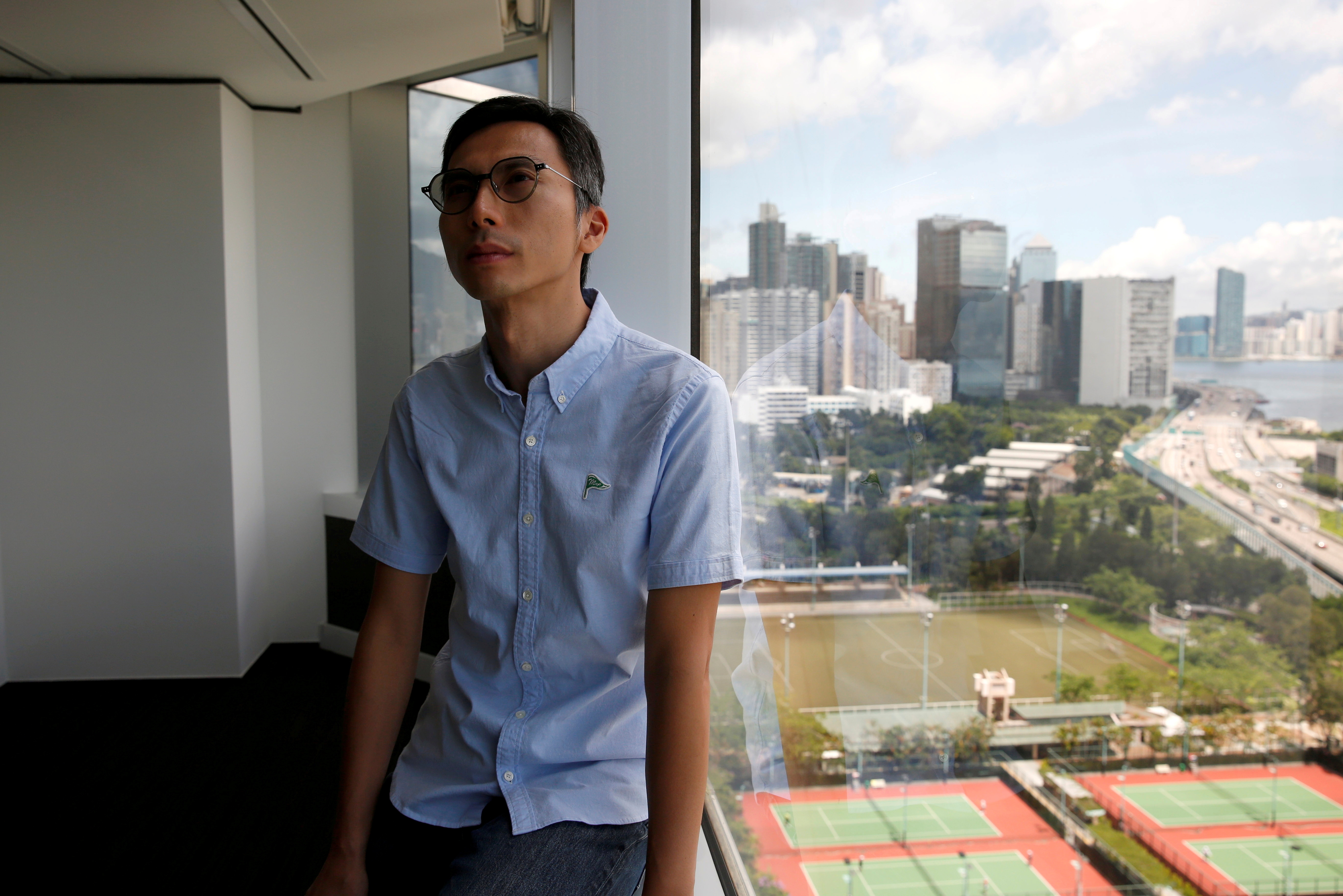 Hong Kong film director Kiwi Chow poses after interview with Reuters, in Hong Kong
