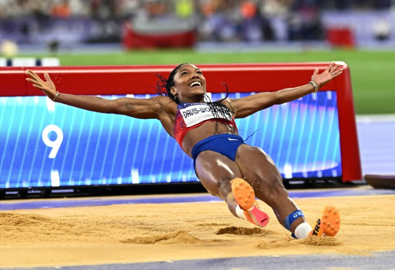 Athletics American flies to first Olympic long jump title Reuters