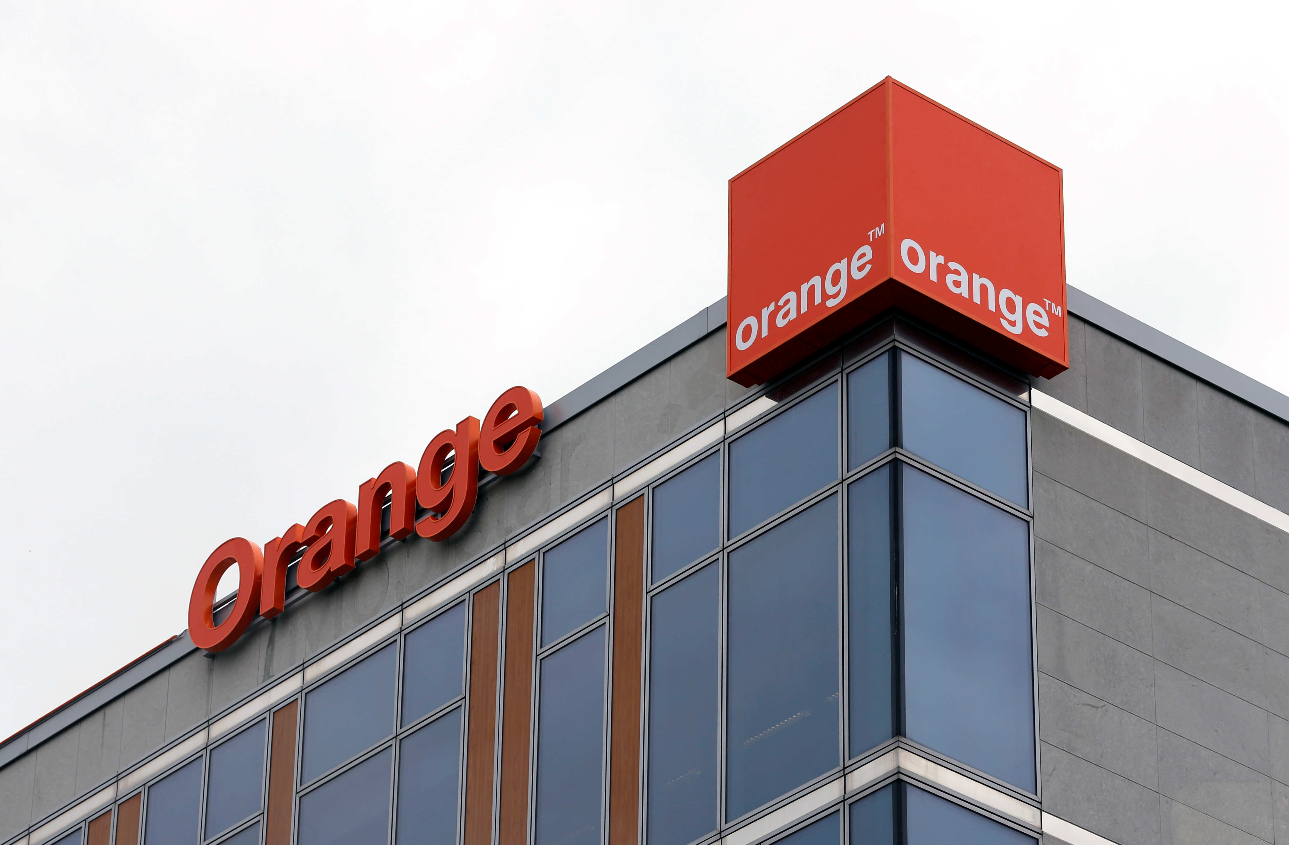 The logo of French telecom operator Orange is pictured on the facade of the Belgian unit in Brussels, Belgium, May 10, 2016.REUTERS/Francois Lenoir