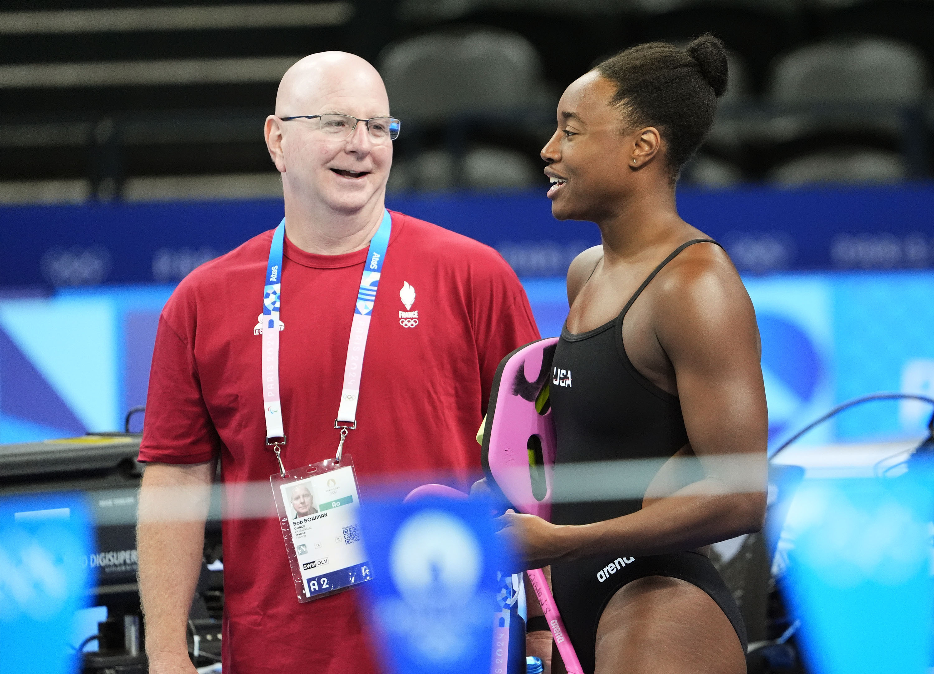 Swimming-Coach Bowman fulfils promise as Marchand claims unprecedented  double | Reuters