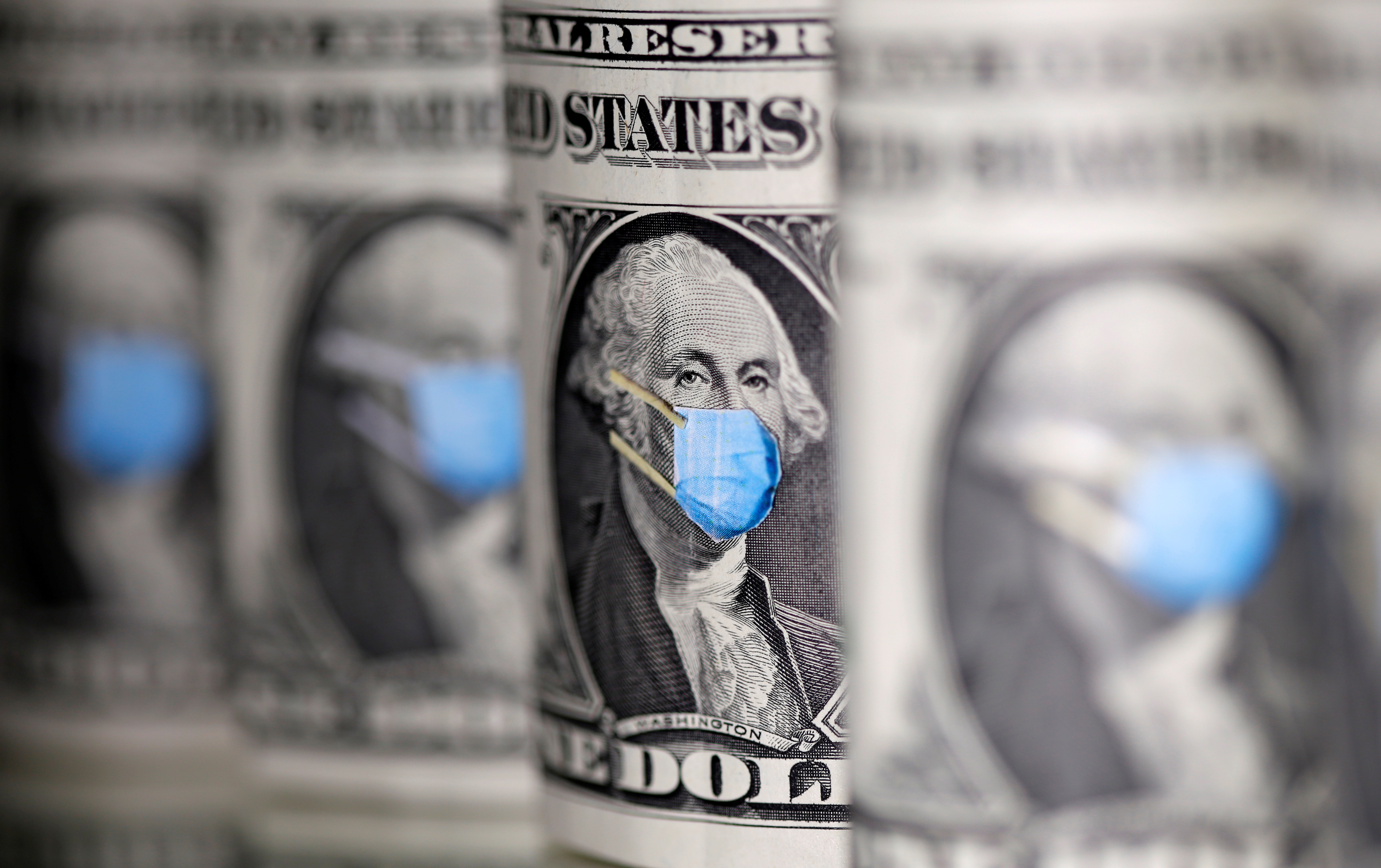 George Washington is seen with printed medical mask on the one Dollar banknotes in this illustration taken