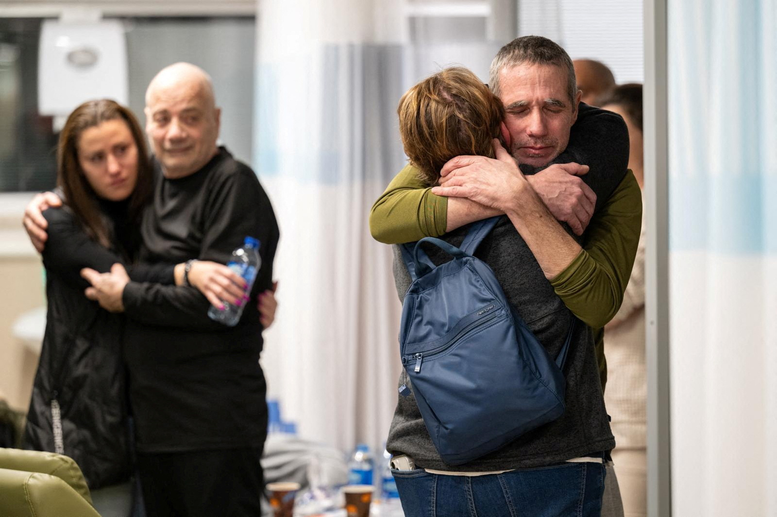 Fernando Simon Marman and Louis Hare reunite with loved ones at Sheba Medical Center, in Ramat Gan