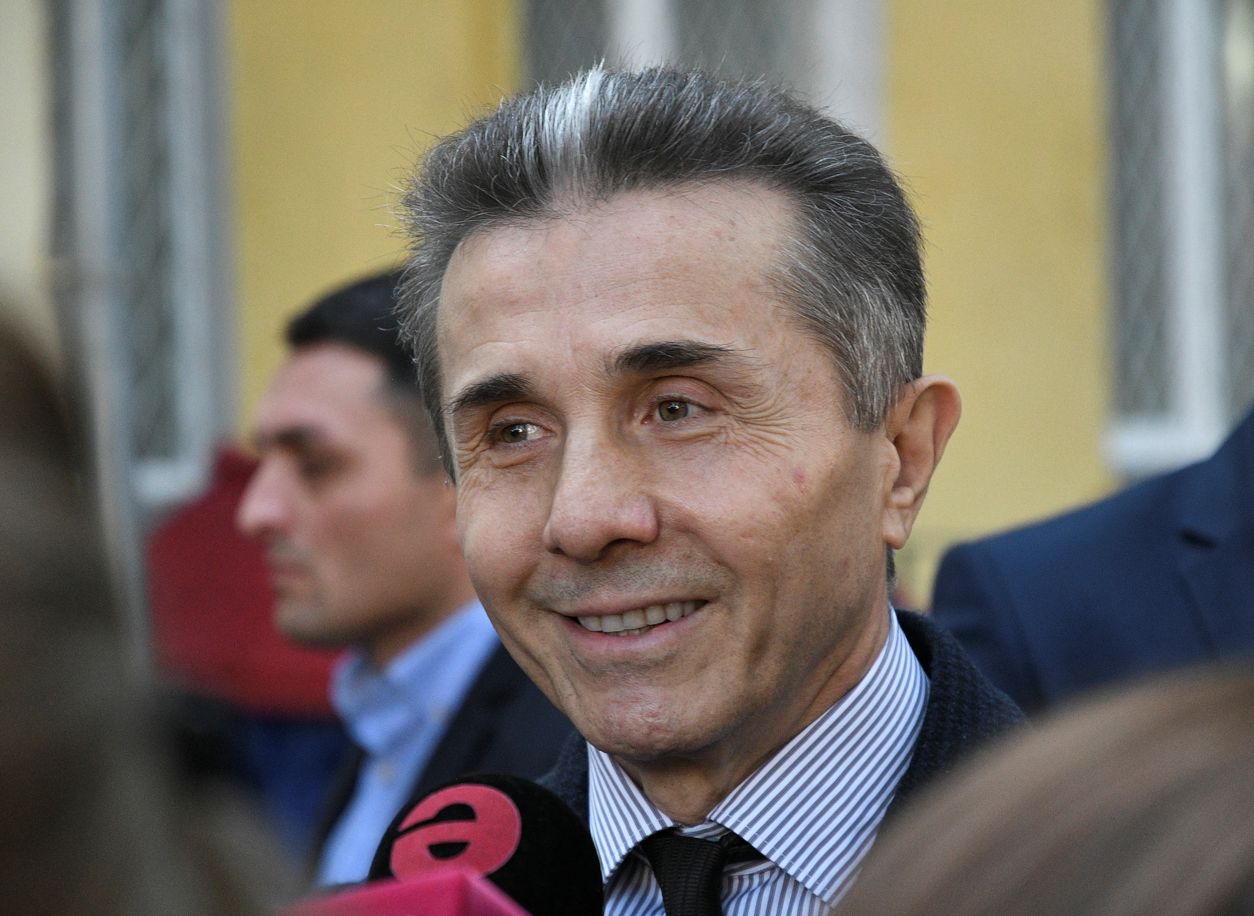 Georgia's former Prime Minister Ivanishvili visits a polling station during the presidential election in Tbilisi