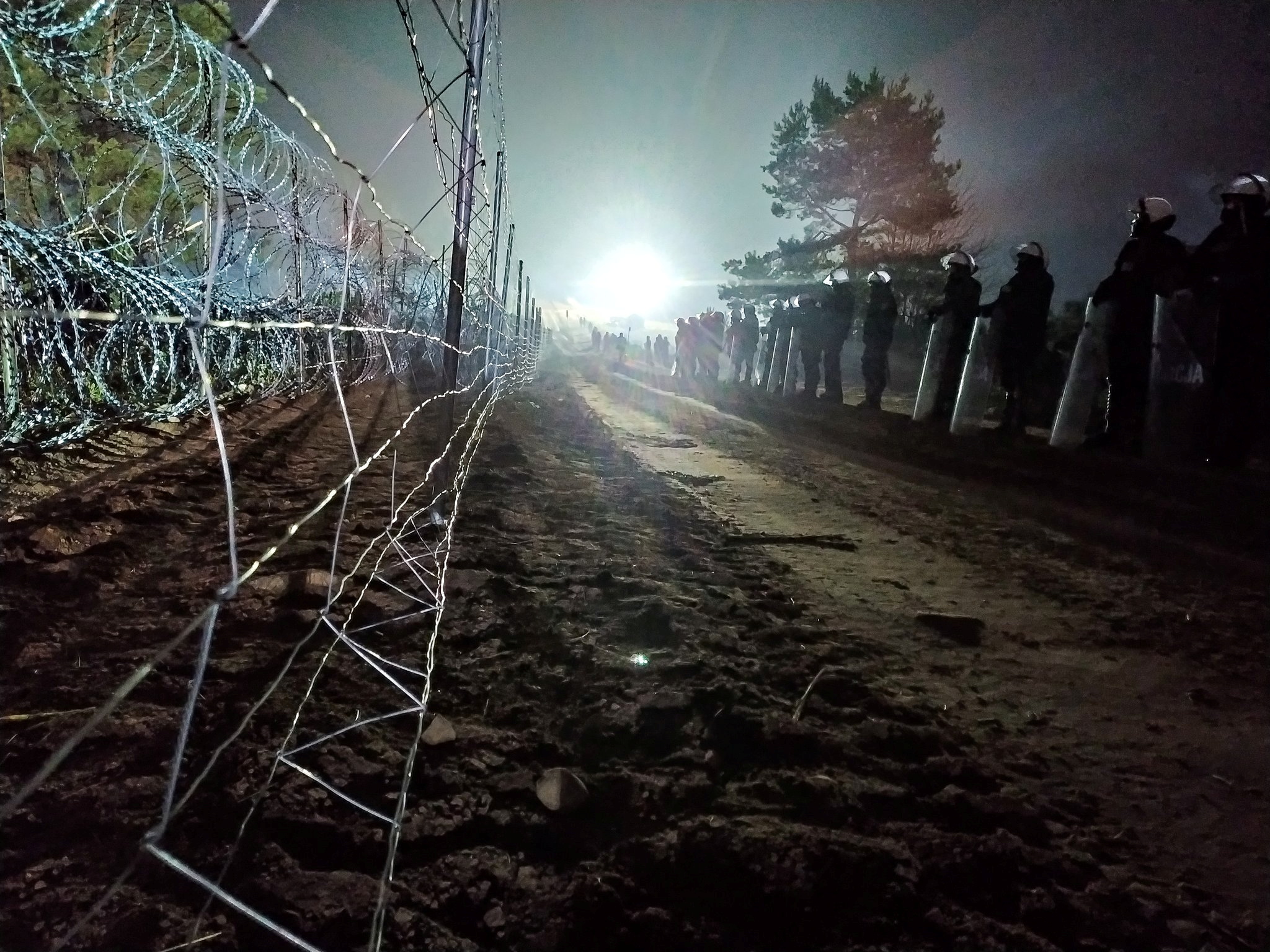 Polish police guard Poland/Belarus border near Kuznica, Poland, in this photograph released by the Police, November 12, 2021. Policja Podlaska/Handout via REUTERS