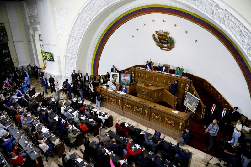 Venezuela legislators approve law to regulate NGOs | Reuters