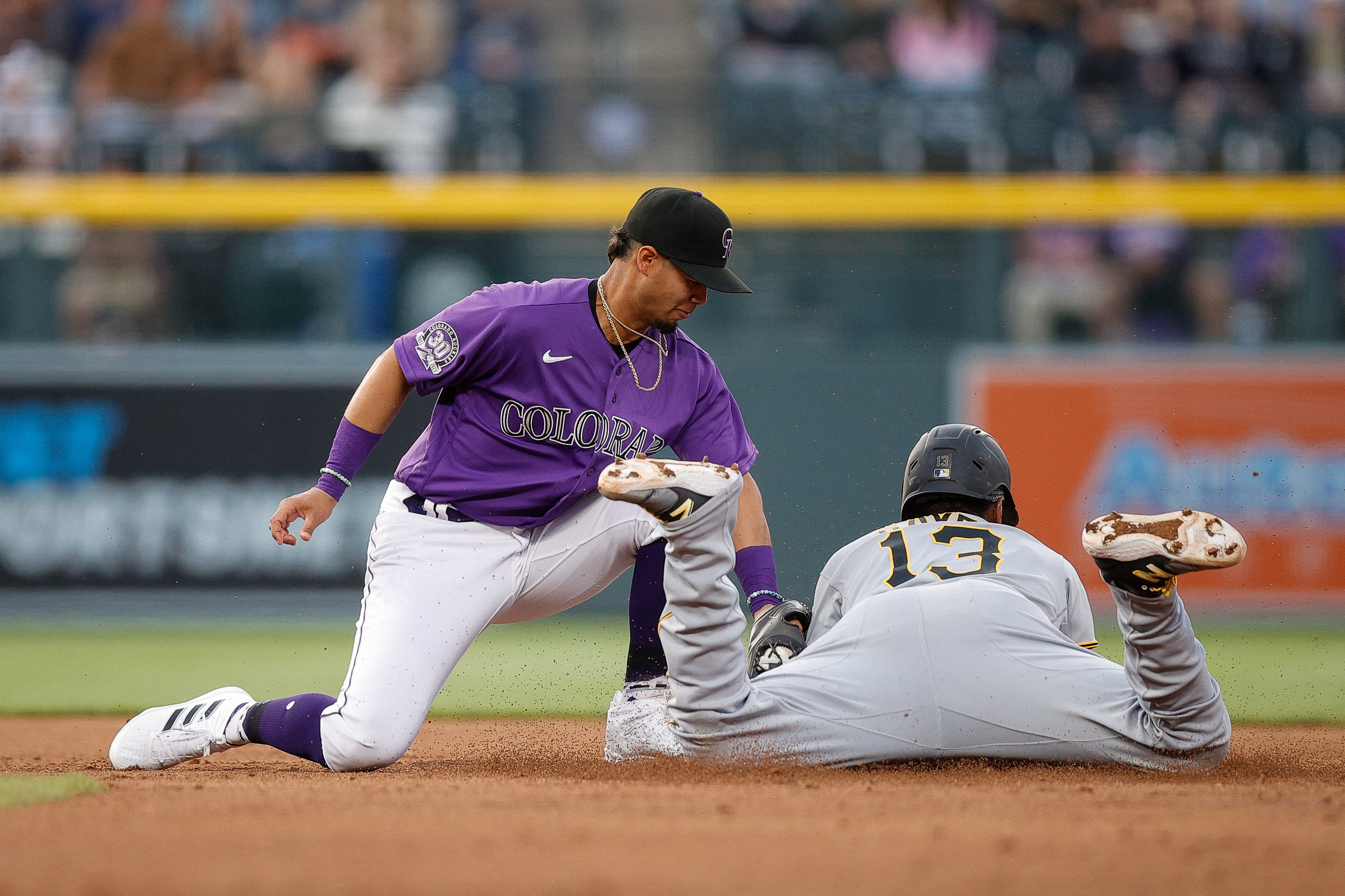 Pirates jump on Rockies early, cruise to 14-3 rout