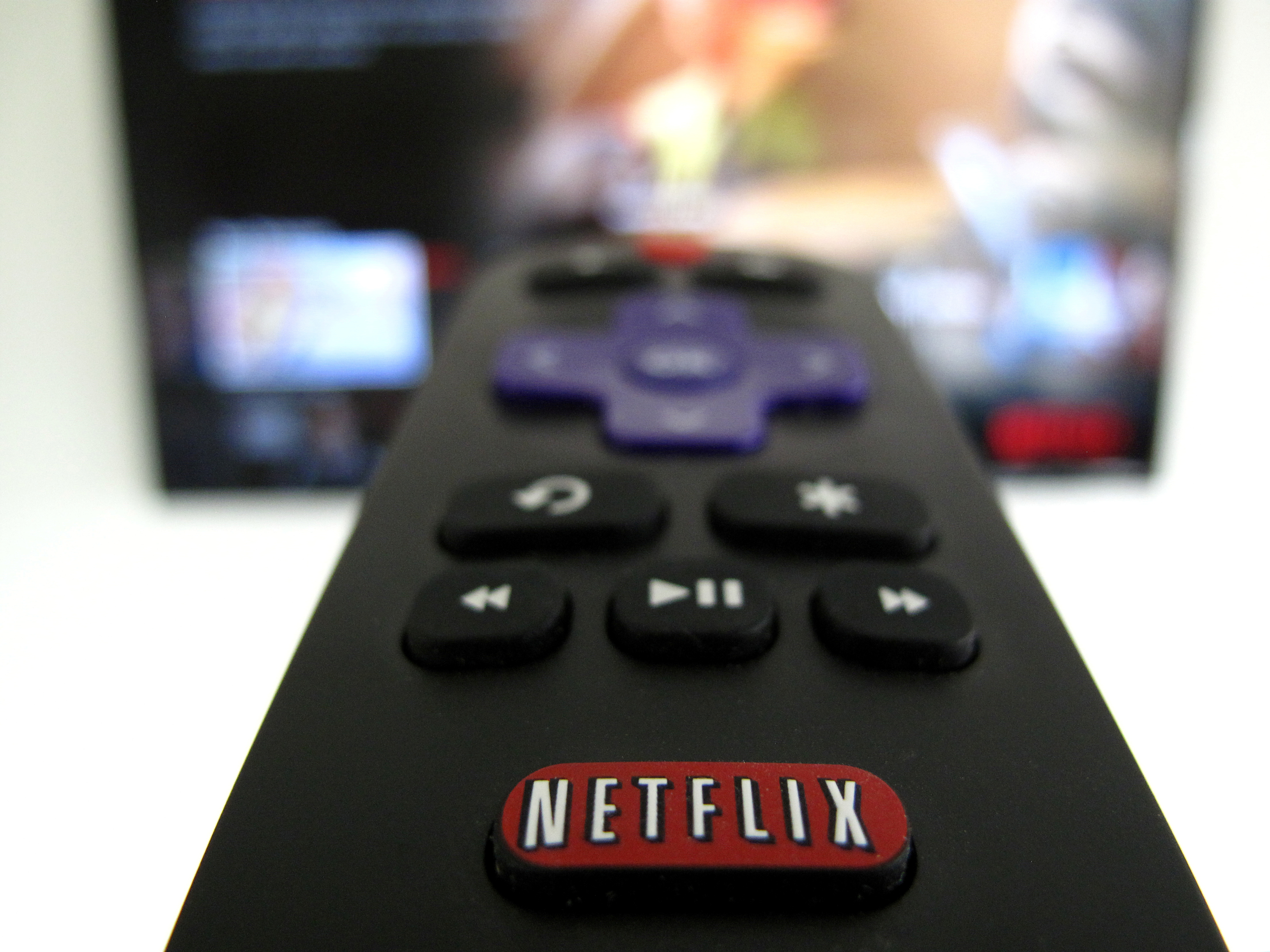 The Netflix logo is pictured on a television remote in this illustration photograph taken in Encinitas, California
