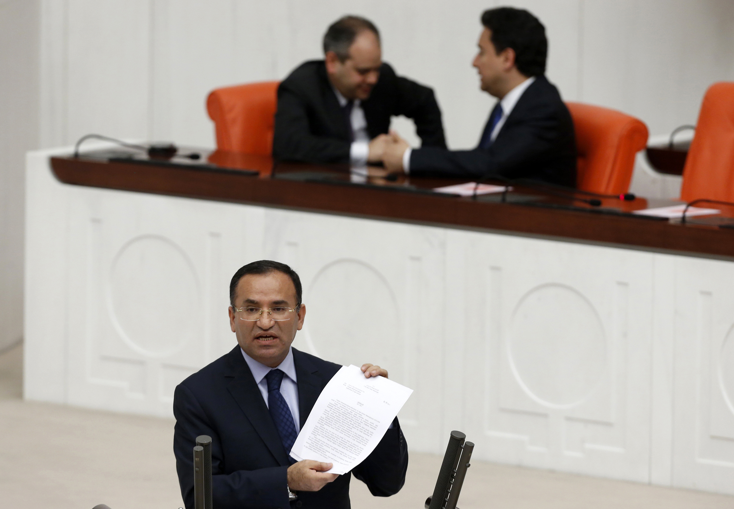 Justice Minister Bekir Bozdag addresses the Turkish Parliament during a debate in Ankara