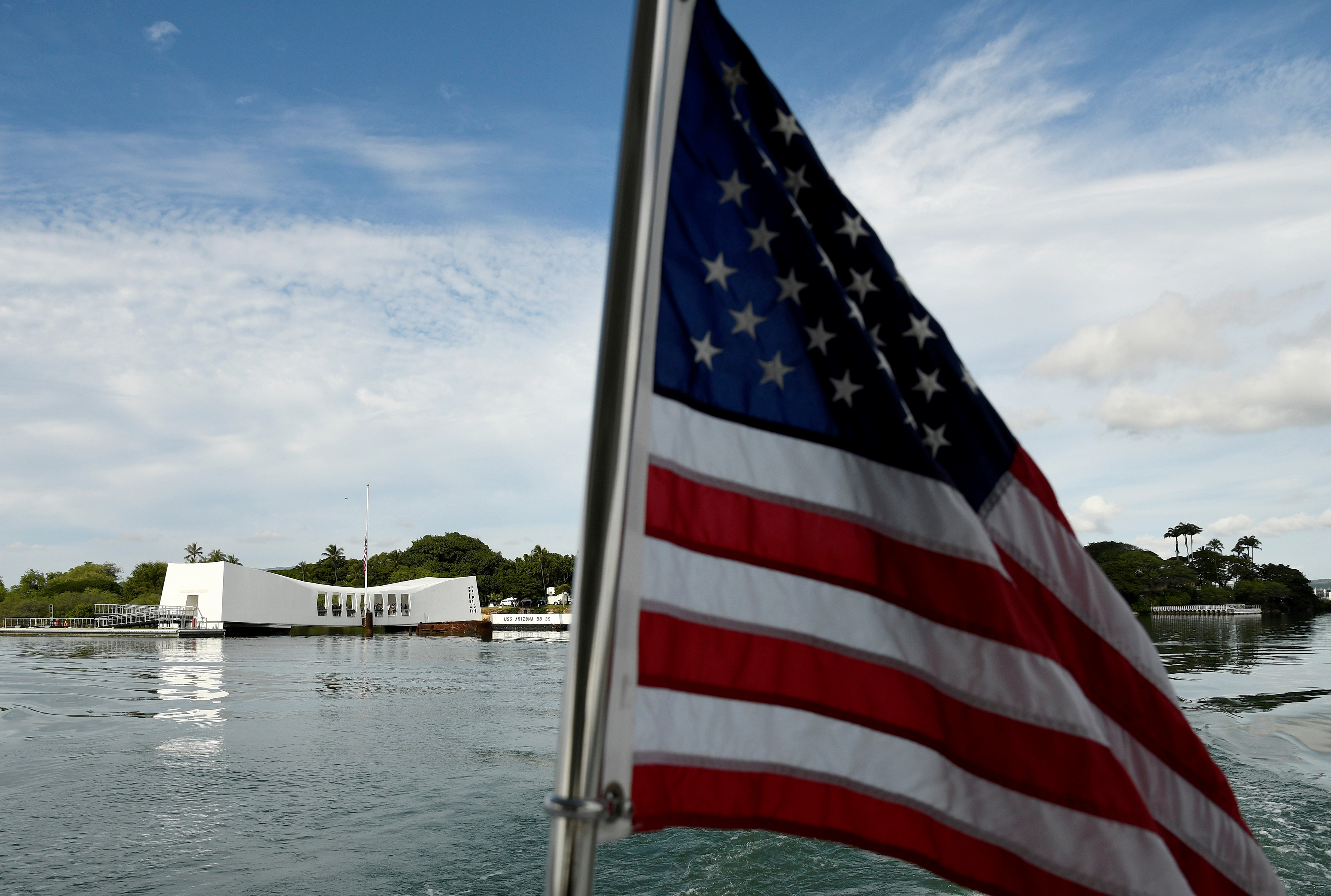 The USS Arizona Memorial can be seen from a shuttle boat during the 75th anniversary of the attack on Pearl Harbor in Honolulu, Hawaii.