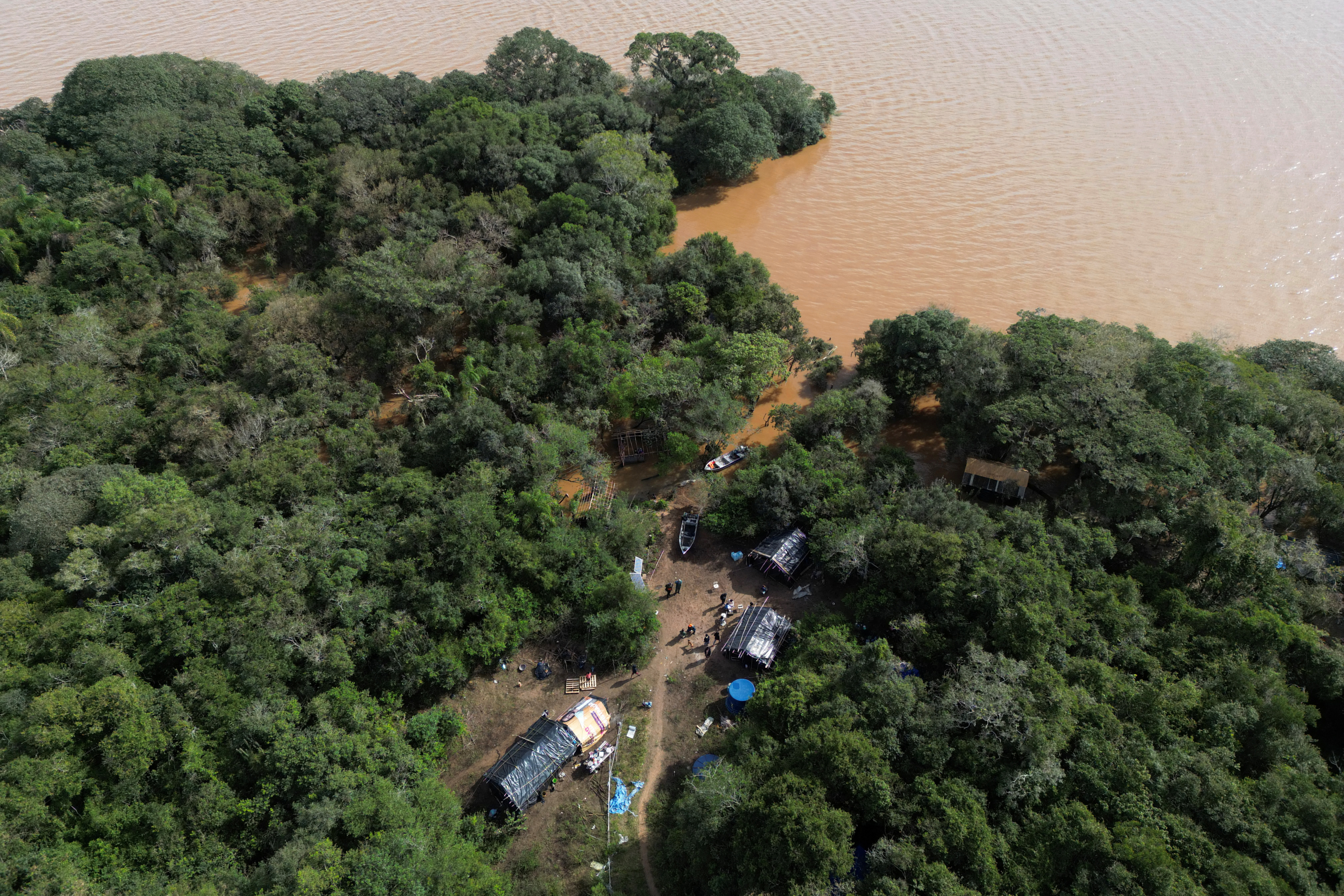 Indigenous Brazil community stays on flooded land in dispute with developer