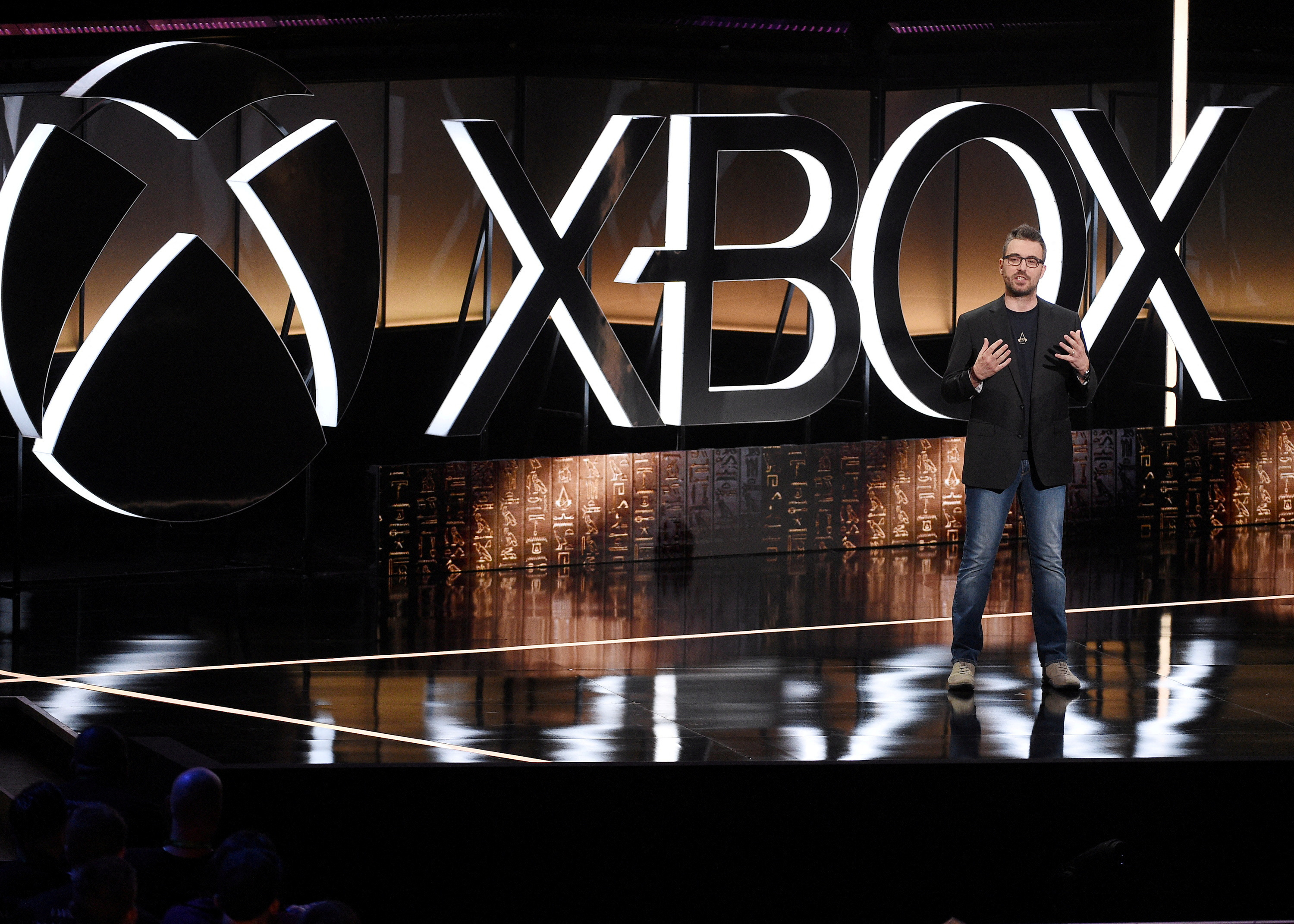 Jean Guesdon, Creative Director at Ubisoft Montreal, speaks during the Microsoft Xbox E3 2017 media briefing in Los Angeles