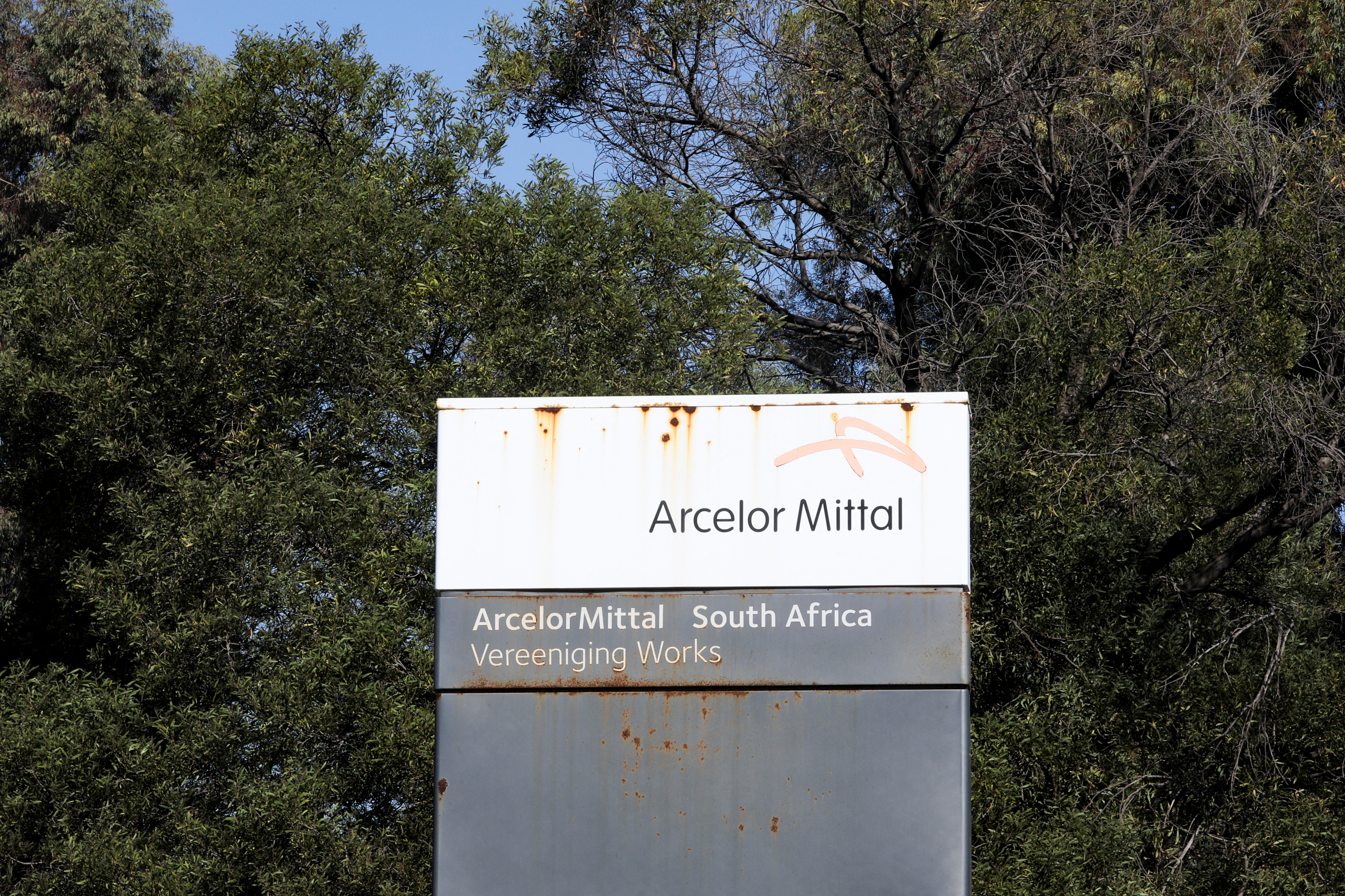 A general view of the sign ArcelorMittal at its Vereeniging plant, in Johannesburg