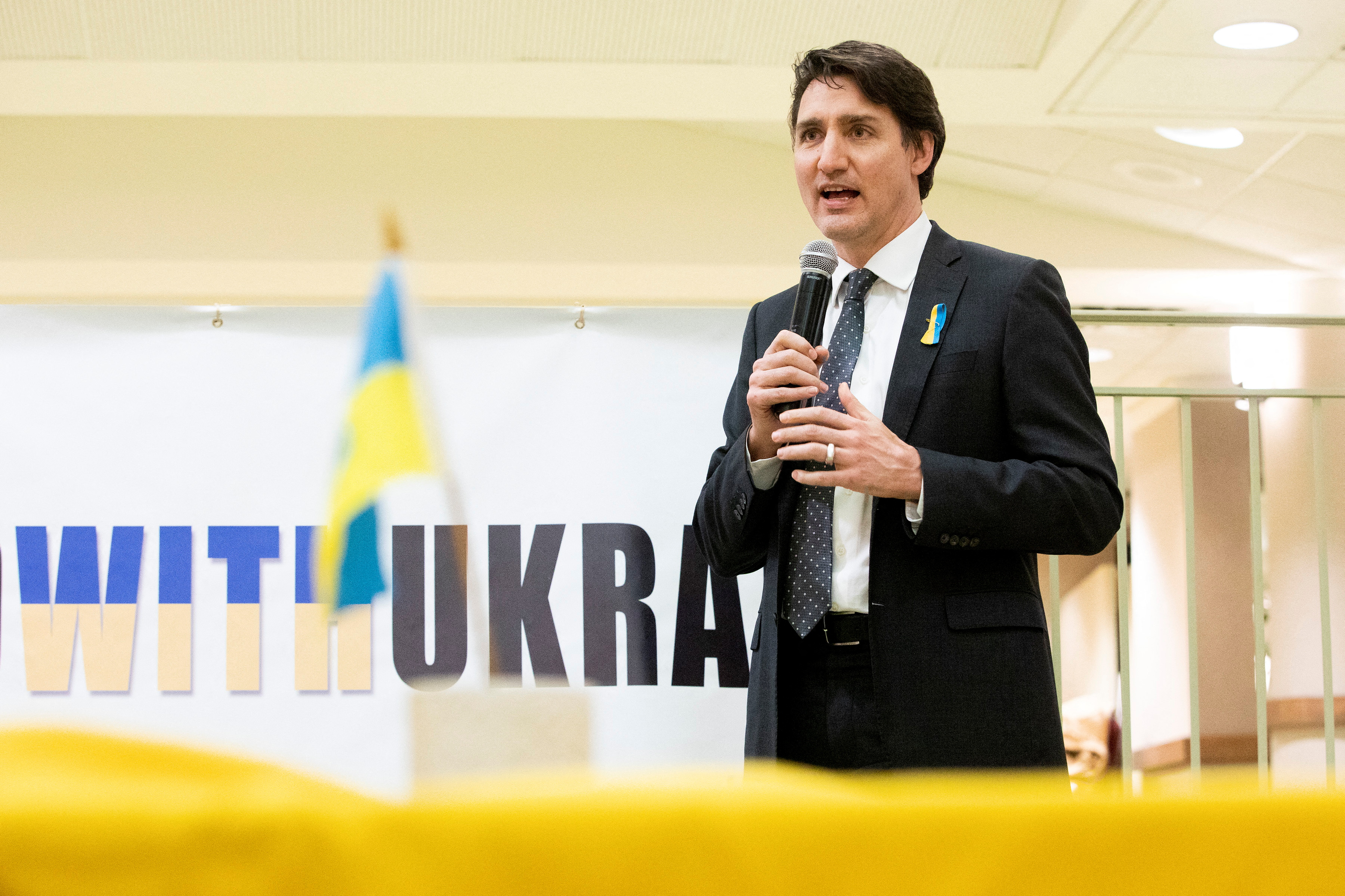 Canada's PM Trudeau visits church to speak with members of Ukrainian community