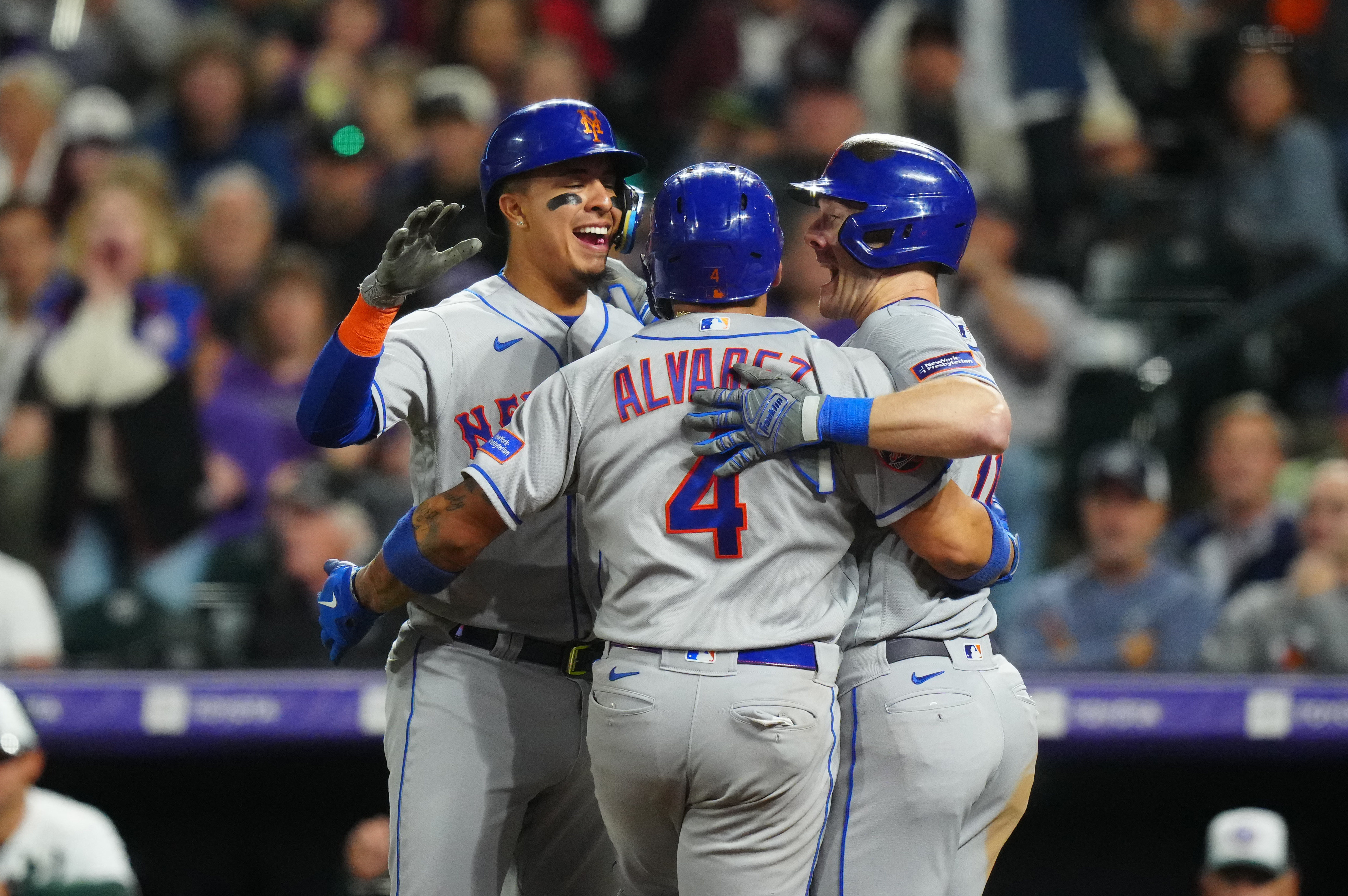 Rockies relinquish six-run lead, but rally past Mets