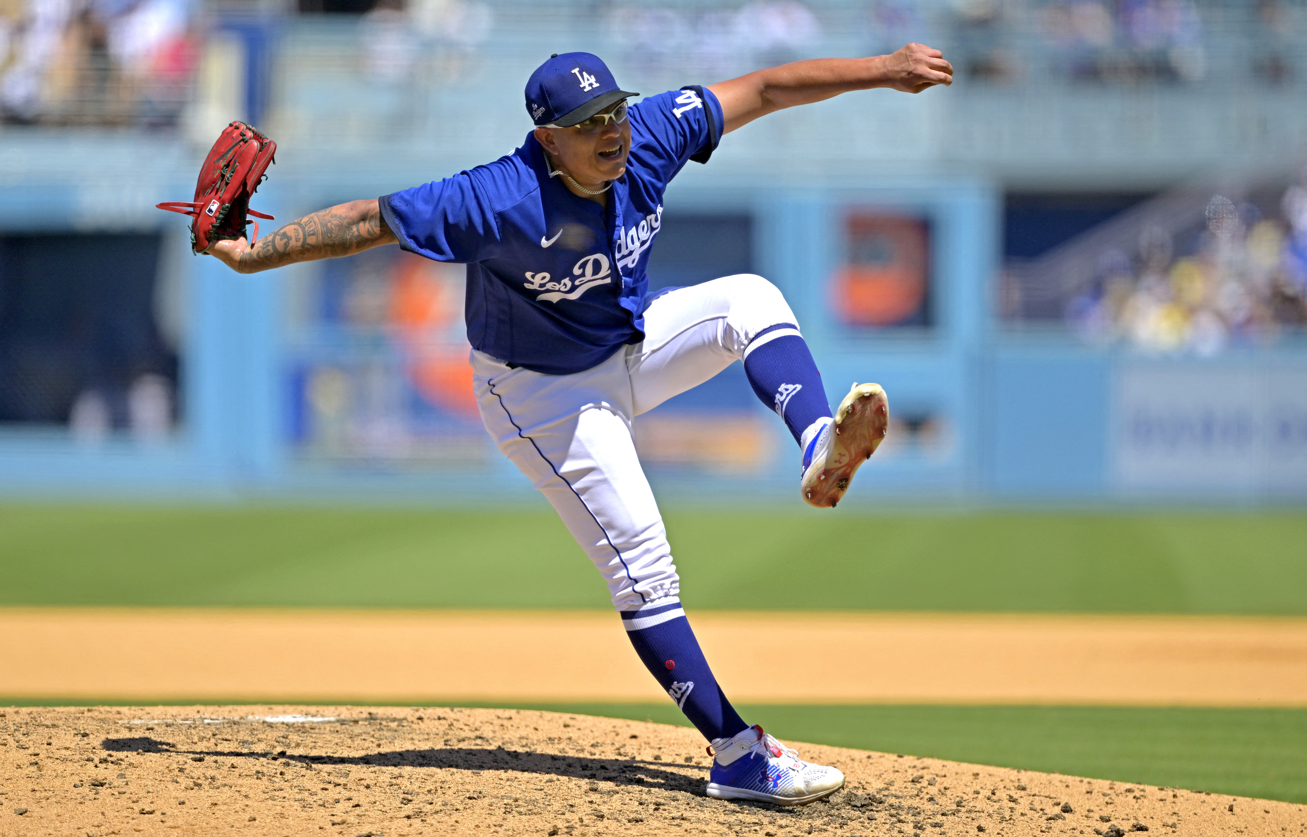 Miguel Rojas, Julio Urias help Dodgers finish 4-game sweep of Rockies