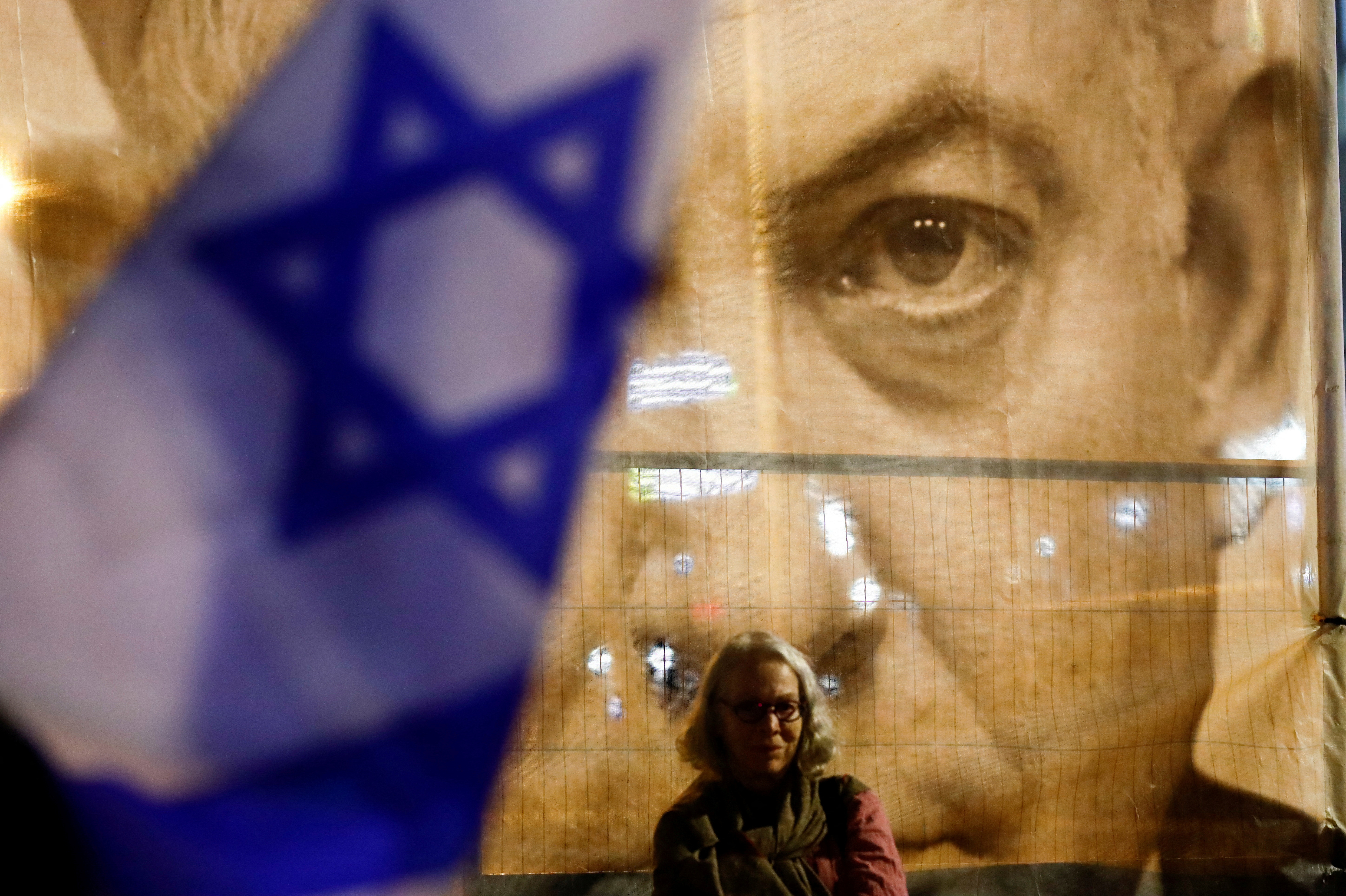 Israelis protest Prime Minister Benjamin Netanyahu's new right-wing coalition and its proposed judicial reforms, in Tel Aviv