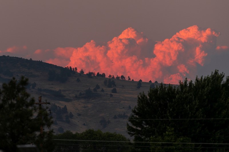 Firefighters deal with extreme conditions as the Bootleg Fire in Oregon expands to over 210,000 acres