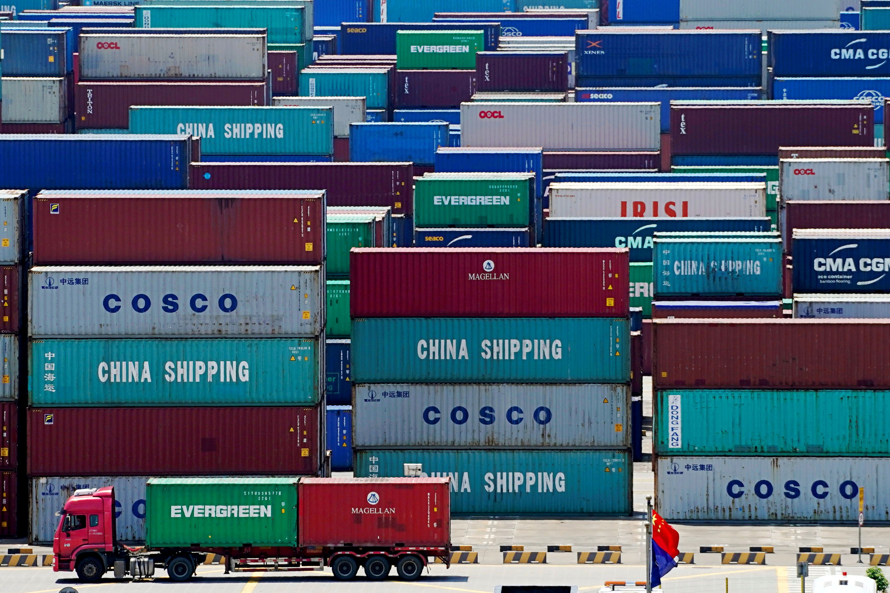 Containers are seen at the Yangshan Deep Water Port in Shanghai, China August 6, 2019. REUTERS/Aly Song/File Photo