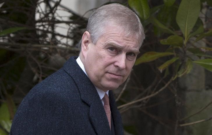 Britain's Prince Andrew leaves after attending the Easter Sunday service at St Georges Chapel at Windsor Castle in southern England