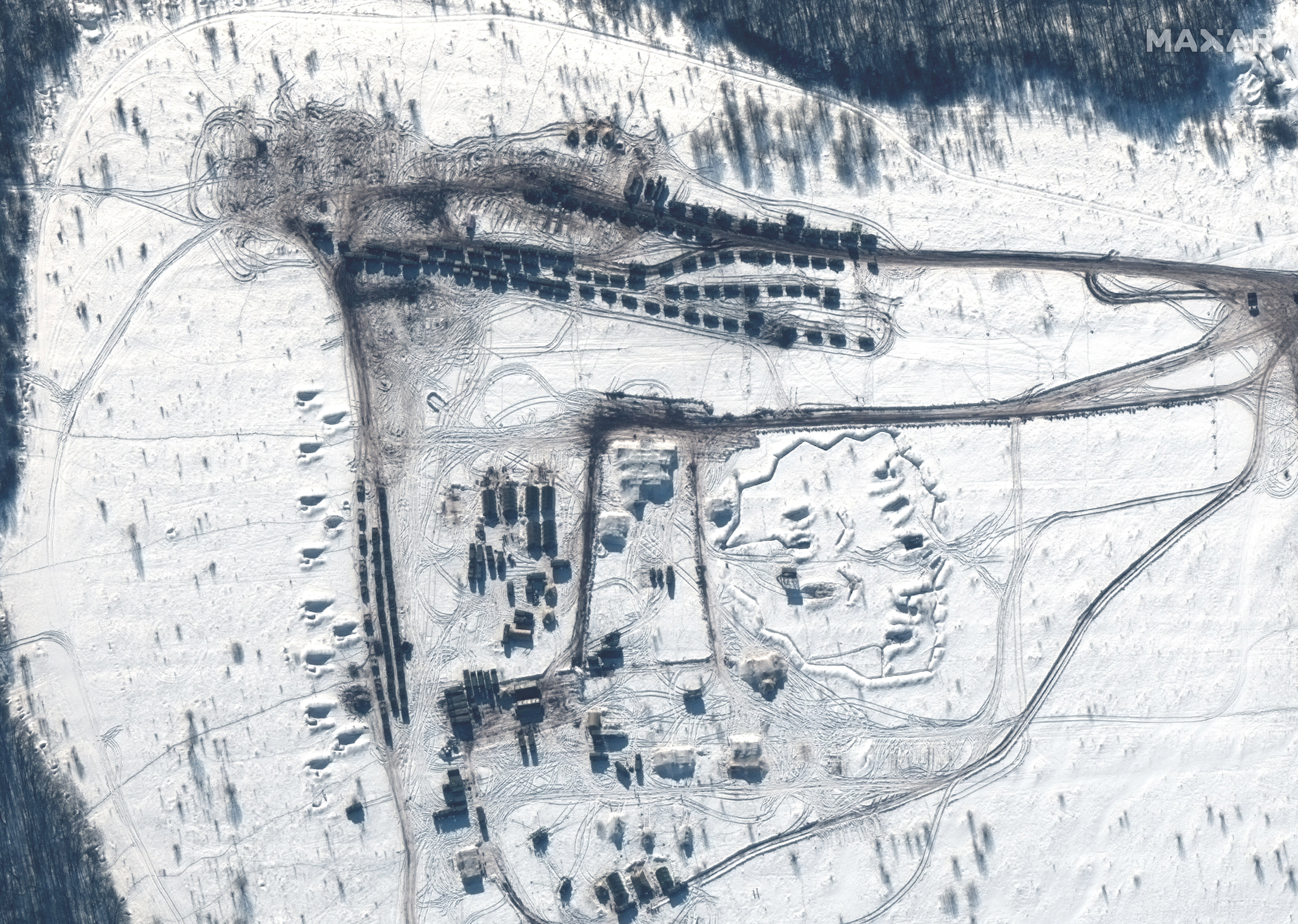 A satellite image shows battle group equipment at the Kursk training area