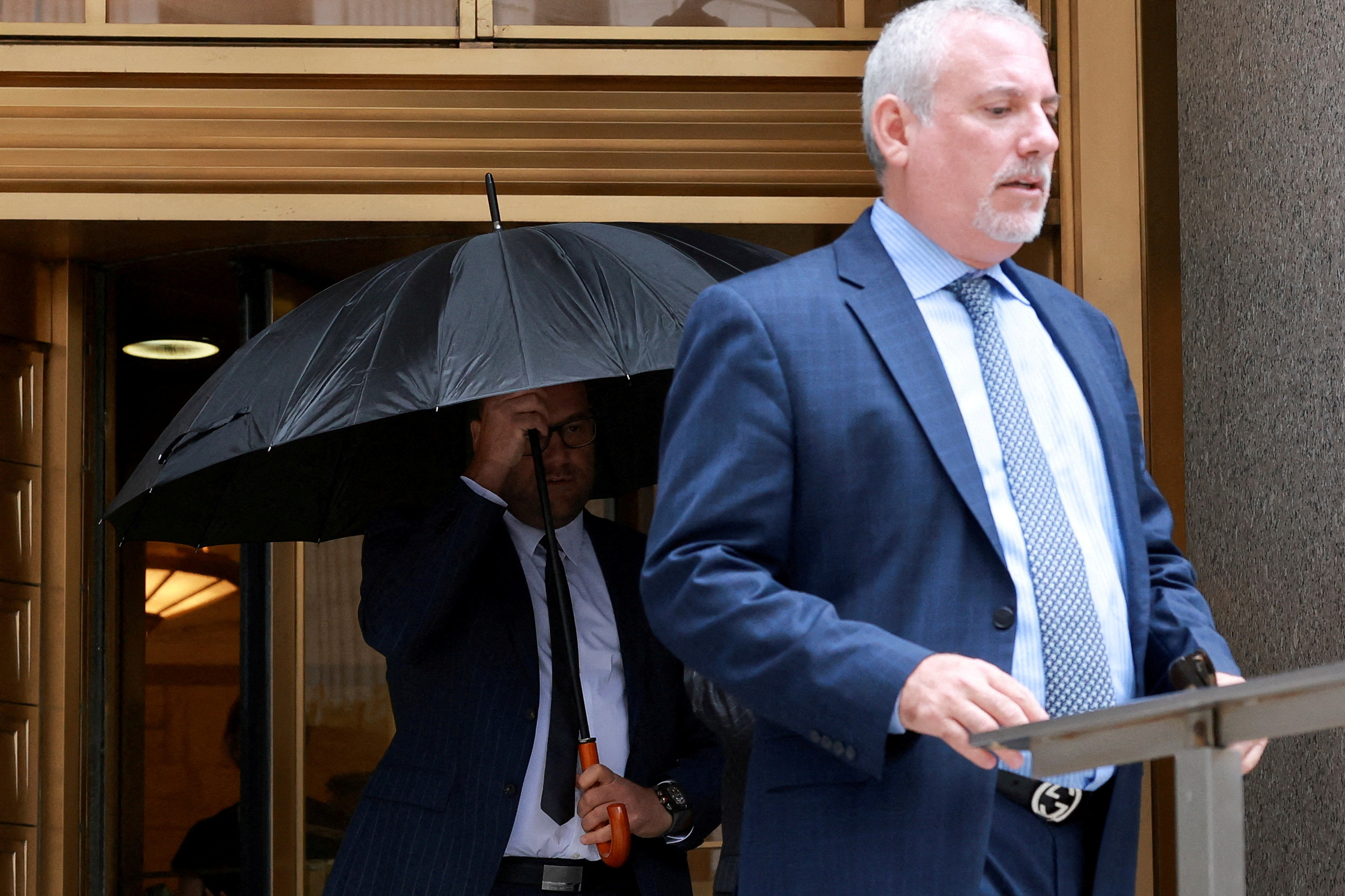 Gerald Shvartsman walks following a hearing at the Manhattan Federal Court, in New York City
