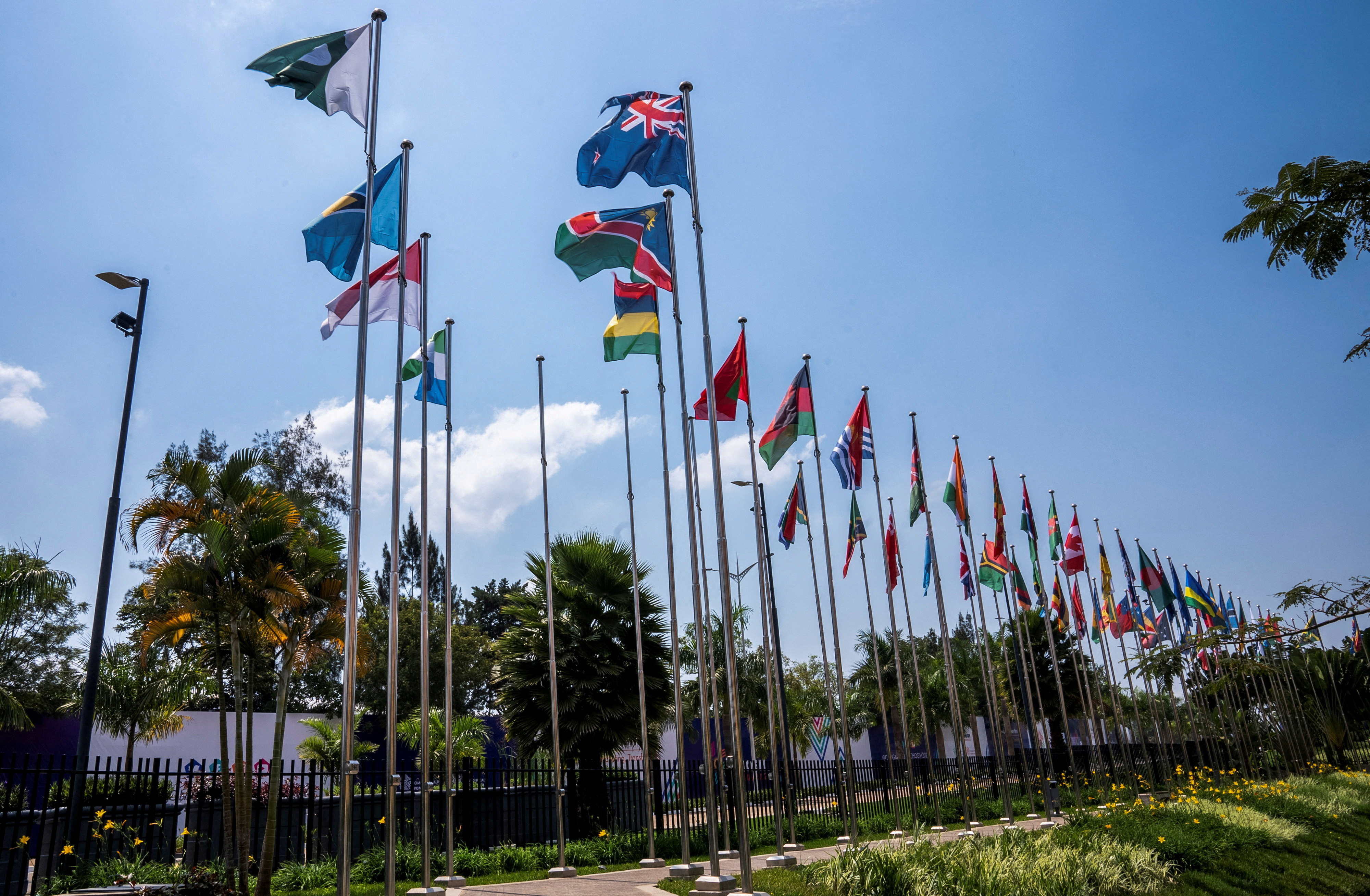 Flags representing Commonwealth countries fly at the Kigali Convention Centre, the venue hosting the Commonwealth Heads of Government Meeting in Kigali