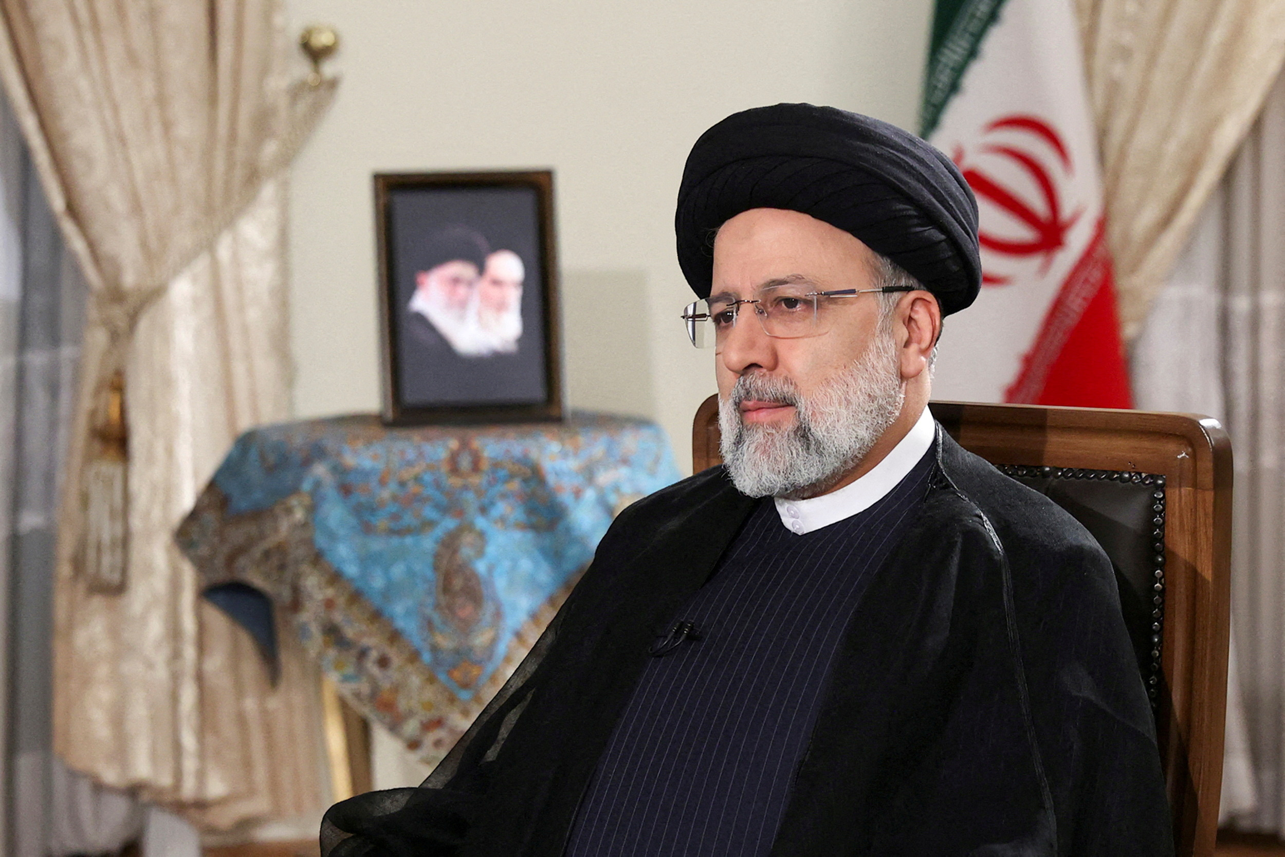 Iranian President Ebrahim Raisi attends a TV interview, in Tehran