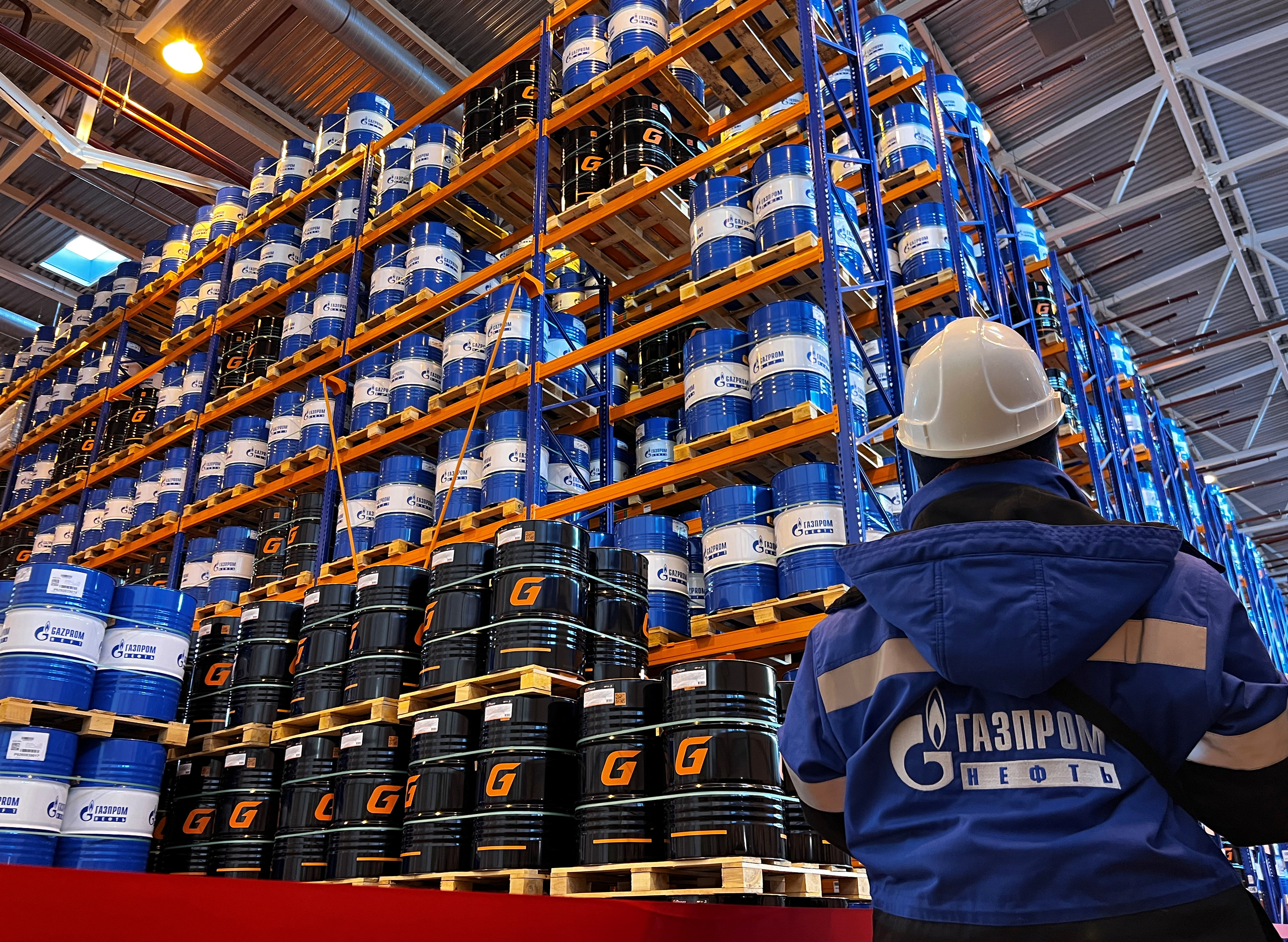 An employee works at Gazprom Neft's Omsk Lubricant Plant (OZSM) in Omsk