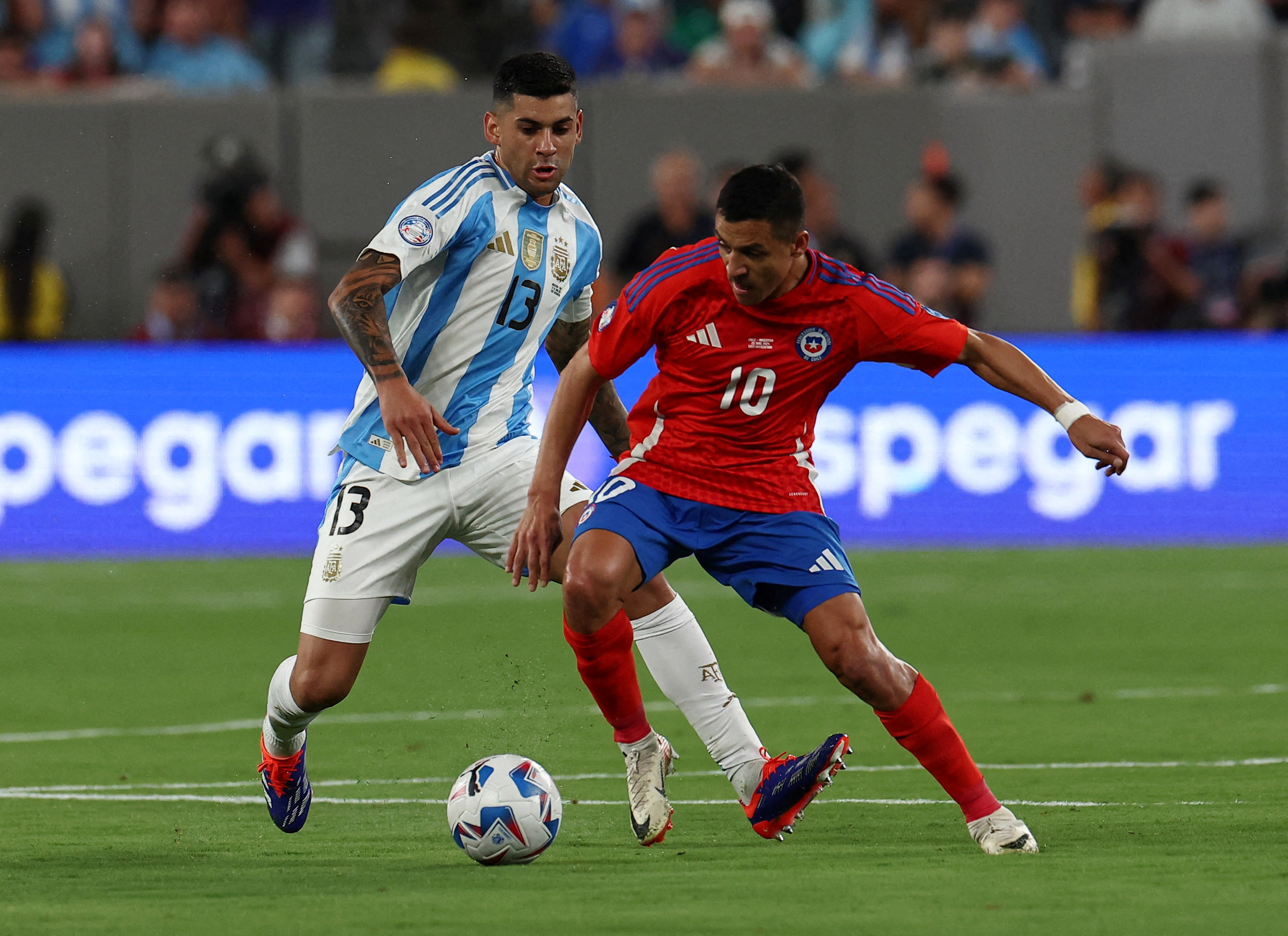 Argentina edge Chile 1-0 to seal Copa America quarter-final place | Reuters