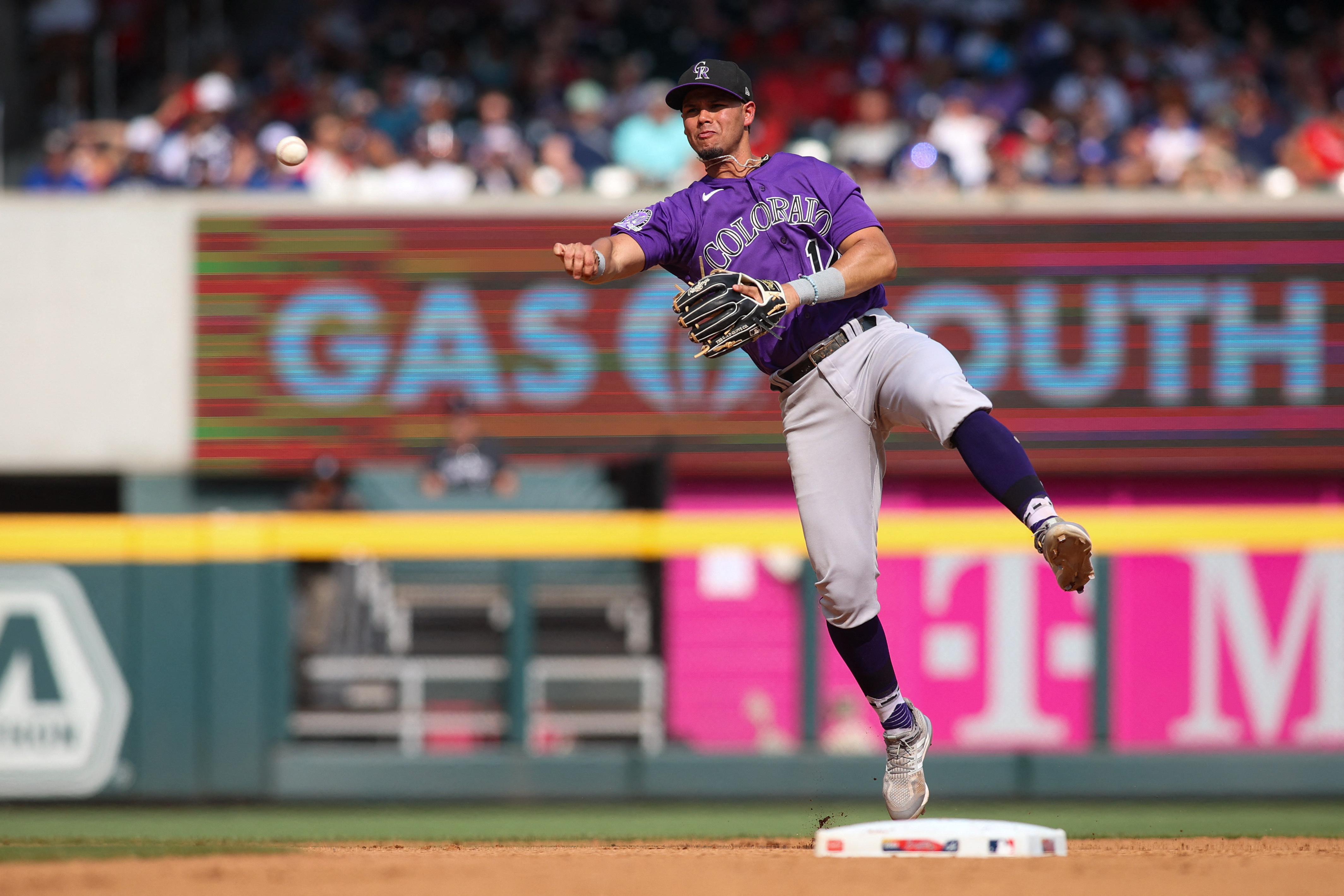 Denver CO, USA. 3rd June, 2022. Atlanta first baseman Matt Olsen (28)  drives in runs int he 10 th inning during the game with Atlanta Braves and  Colorado Rockies held at Coors