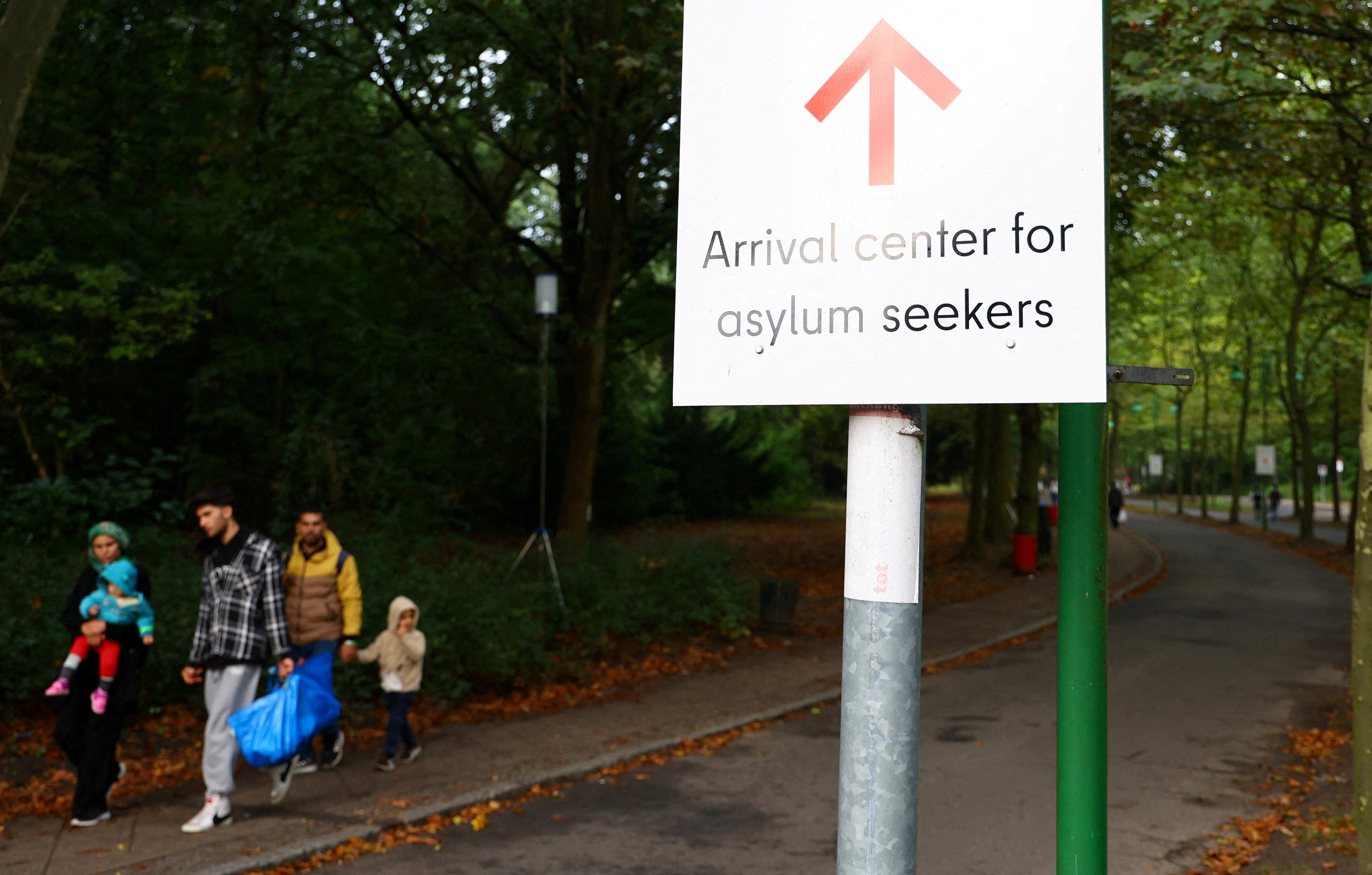 Migrants are pictured at the arrival center for asylum seekers at Berlin's Reinickendorf district