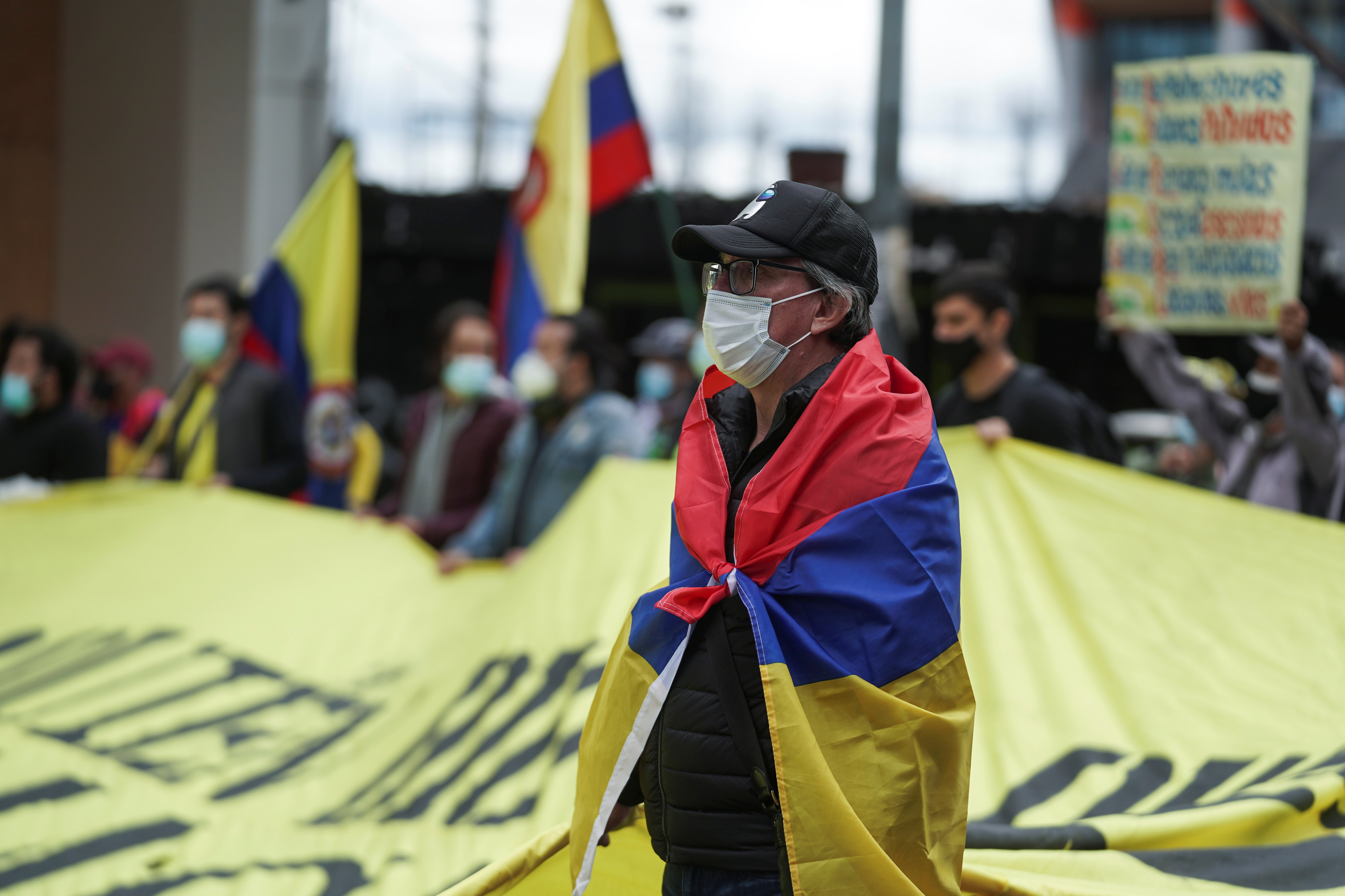 Demonstrators gather for an anti-government march demanding changes to the social and economic policies, during Colombia's Independence Day, in Bogota