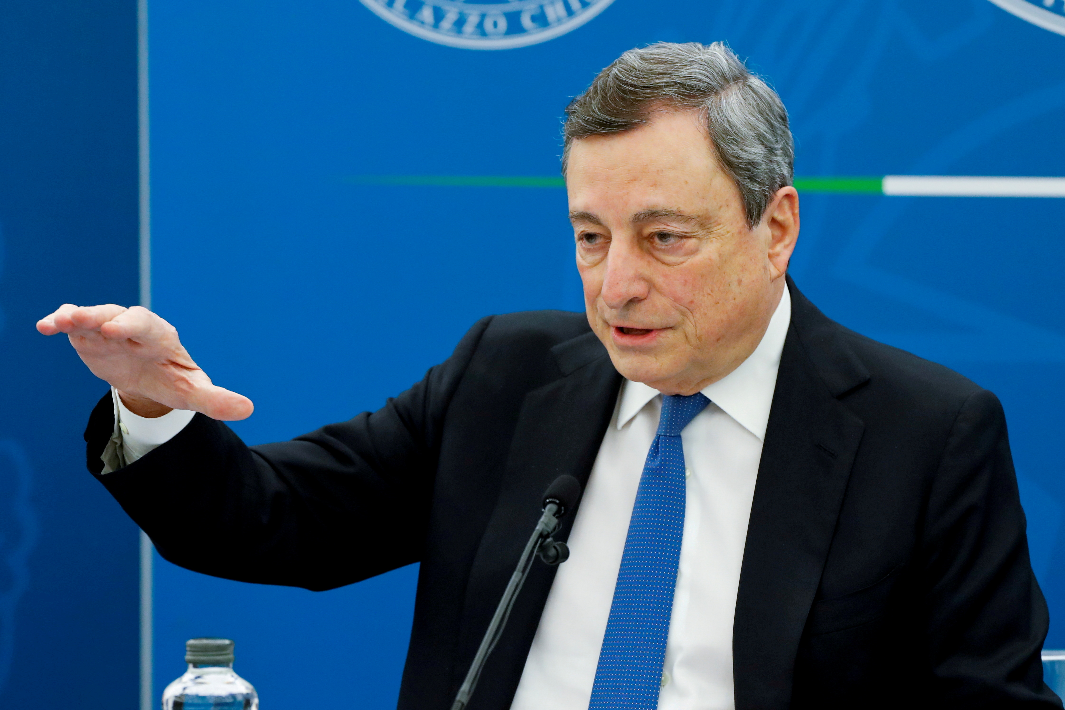 Italy's Prime Minister Mario Draghi gestures as he speaks at a news conference where he is expected to map out the country's next moves in loosening coronavirus disease (COVID-19) restrictions, in Rome, Italy, April 16
