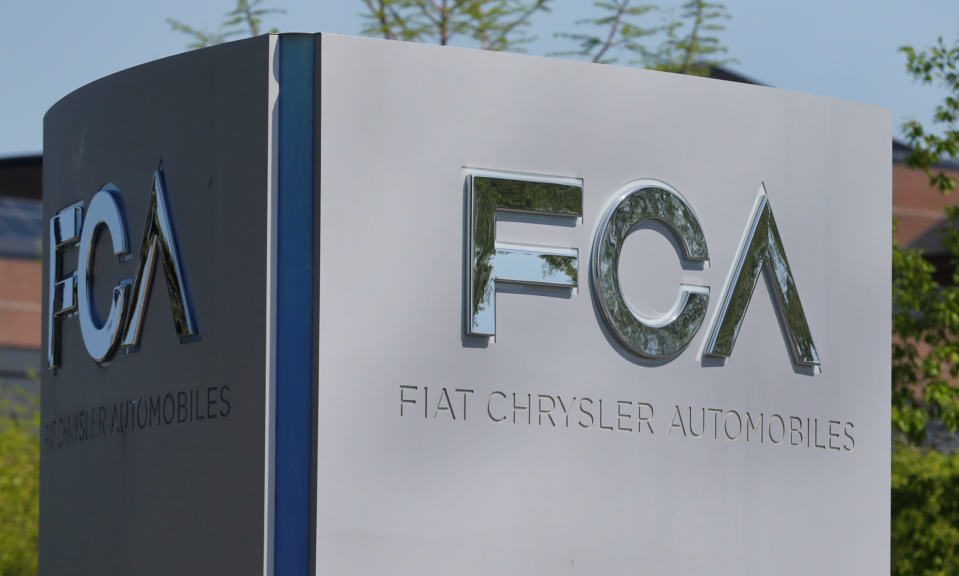 A Fiat Chrysler Automobiles (FCA) sign at the U.S. headquarters in Auburn Hills, Michigan. REUTERS/Rebecca Cook