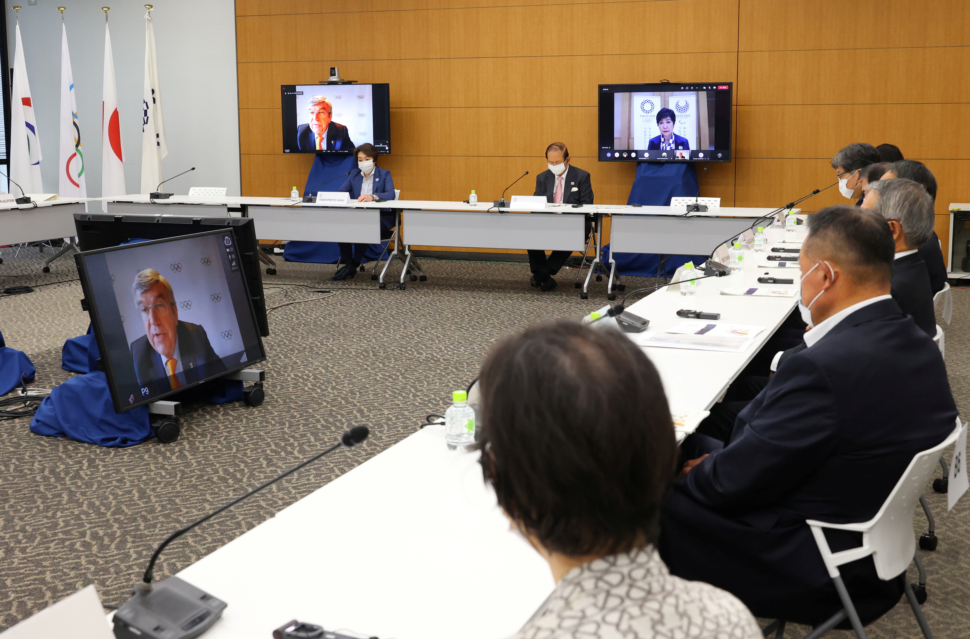 International Olympic Committee (IOC) president Thomas Bach delivers an opening speech on a screen at a meeting of the IOC Coordination Commission for the Tokyo 2020 Olympics, in Tokyo, Japan, May 19, 2021. Yoshikazu Tsuno/POOL via REUTERS