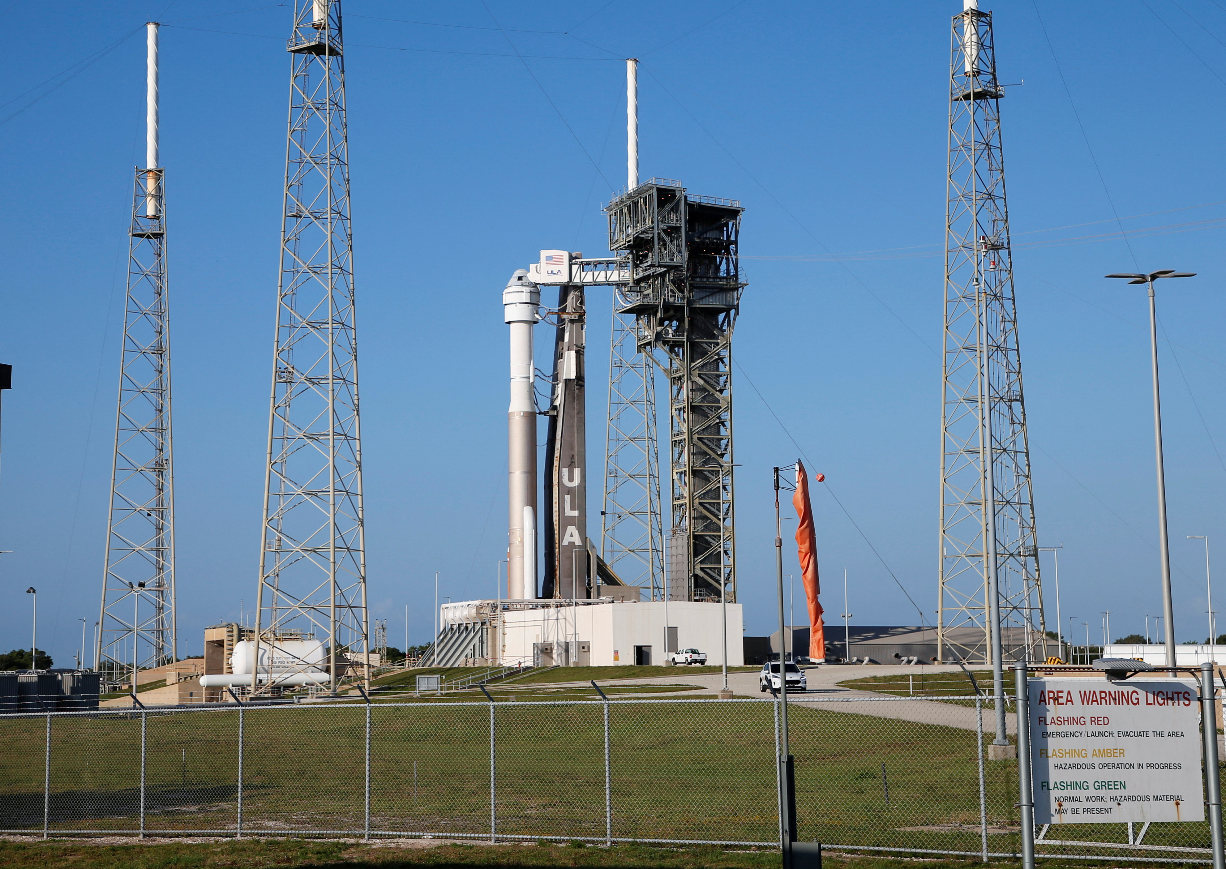 A United Launch Alliance Atlas V rocket stands on the pad after the launch of two astronauts aboard Boeing's Starliner-1 Crew Flight Test (CFT) was delayed