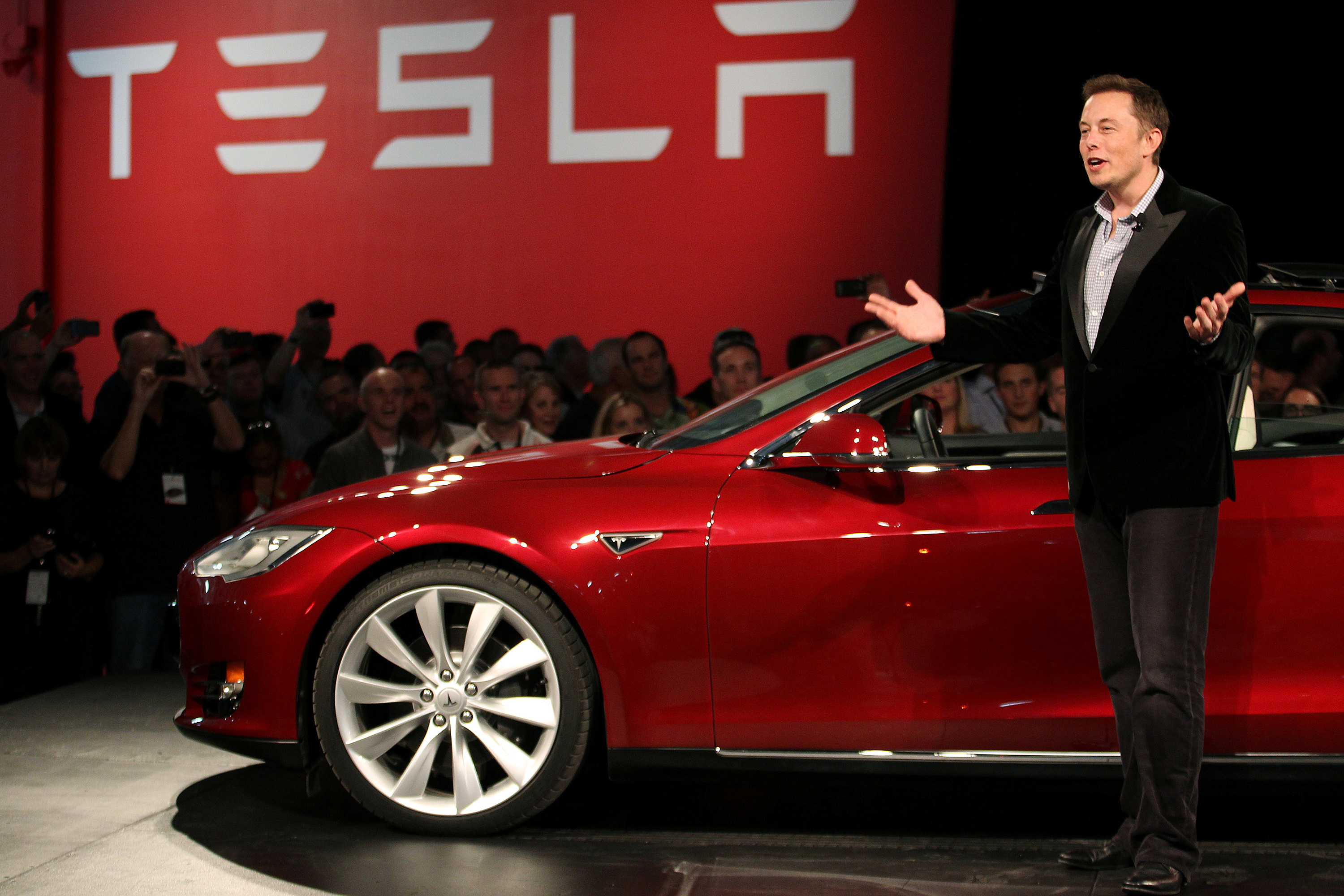 Tesla Motors CEO Elon Musk speaks during the Model S Beta Event held at the Tesla factory in Fremont