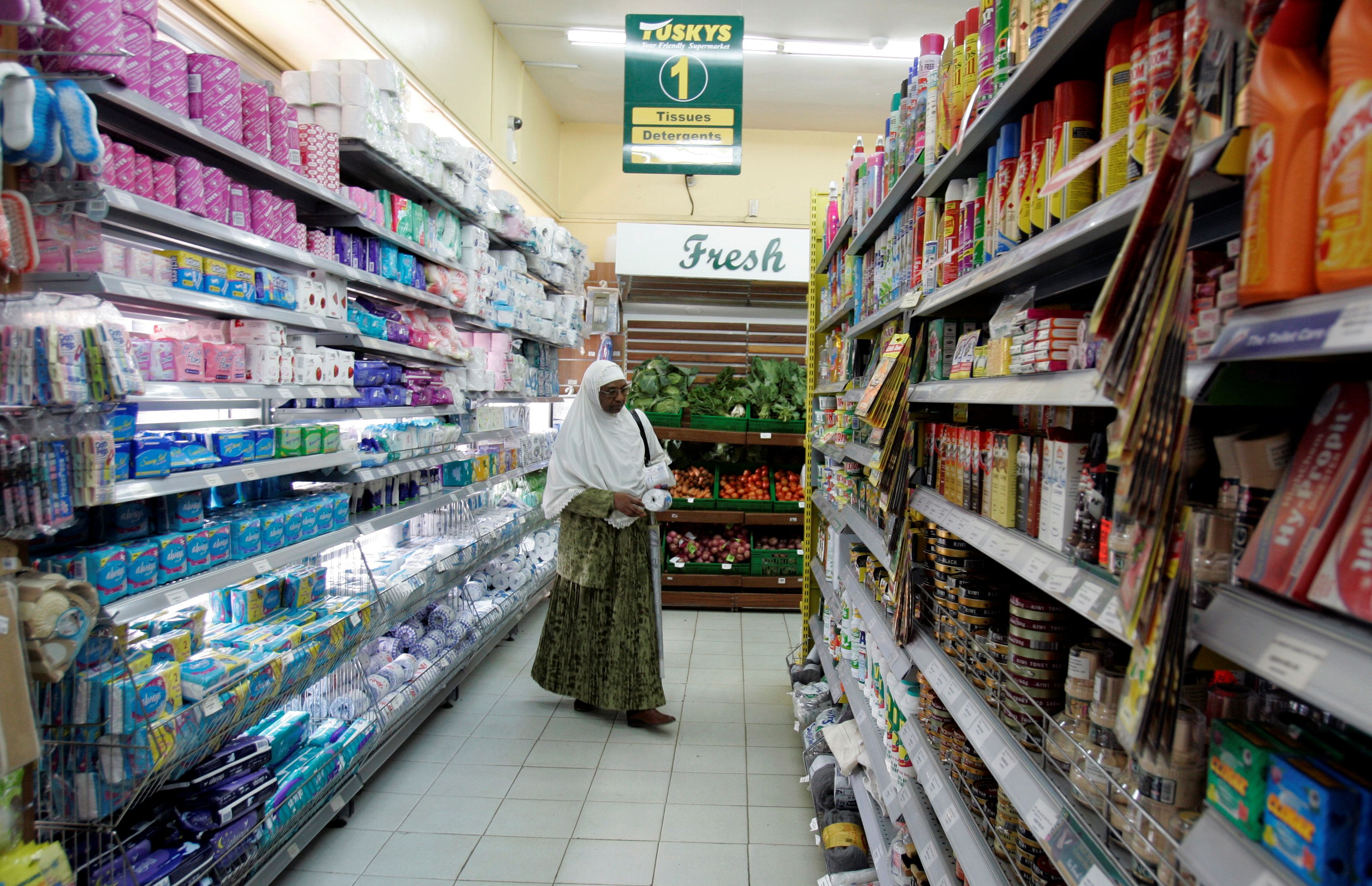 A woman shops at a supermarket in Nairobi