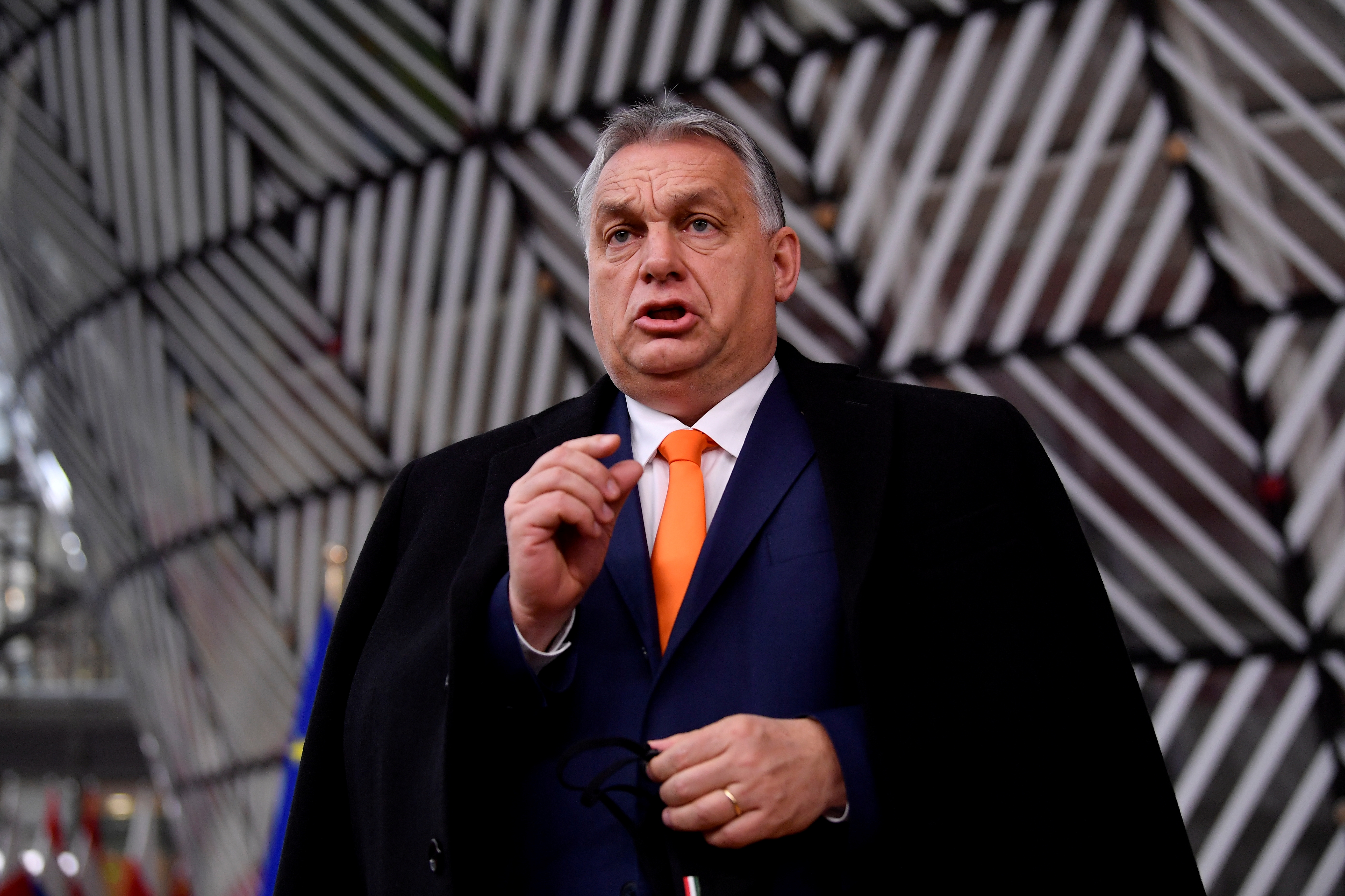Hungary's Prime Minister Viktor Orban speaks as he arrives to attend a face-to-face EU summit amid the coronavirus disease (COVID-19) lockdown in Brussels, Belgium December 10, 2020. John Thys/Pool via REUTERS/File Photo